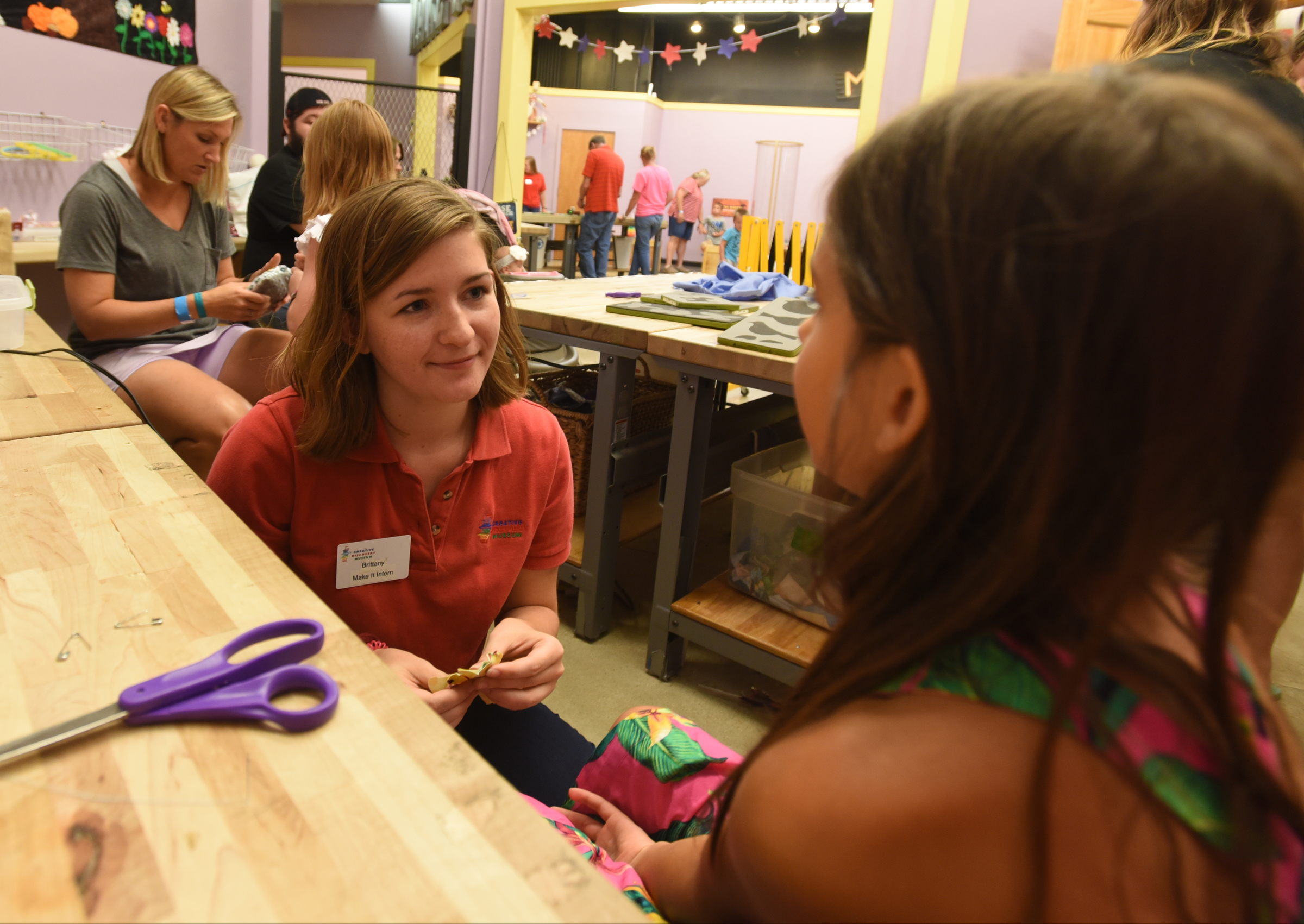 Brittany O'Dell works with Melissa Johnson Wednesday, July 13, 2016, at the Creative Discovery Museum. O'Dell is working an internship through the Step-Up program.
