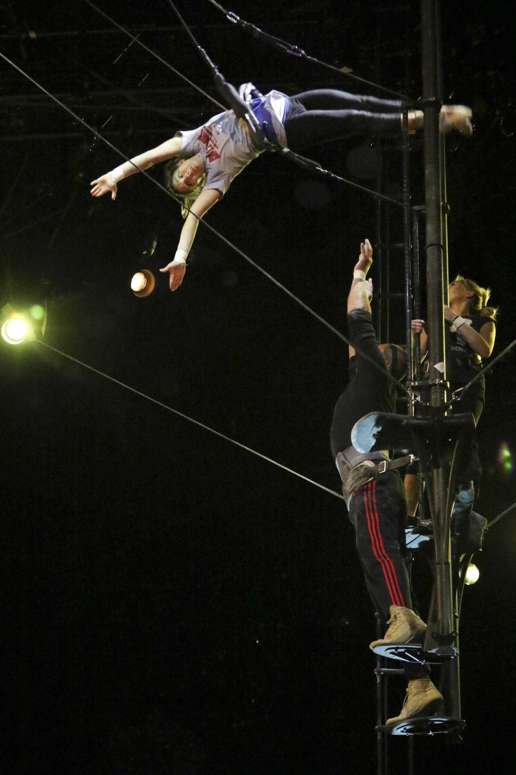 Staff Photo by Dan Henry / The Chattanooga Times Free Press- 7/20/16. Arial performers warm up before the opening night of the OVO Cirque Du Soleil being held at McKenzie arena in Chattanooga, Tenn., July 20-24 2016. The OVO Cirque show features performers as insects in colorful costumes performing acts including foot juggling, hand balancing, rock climbing, acrobatics and slack lining.