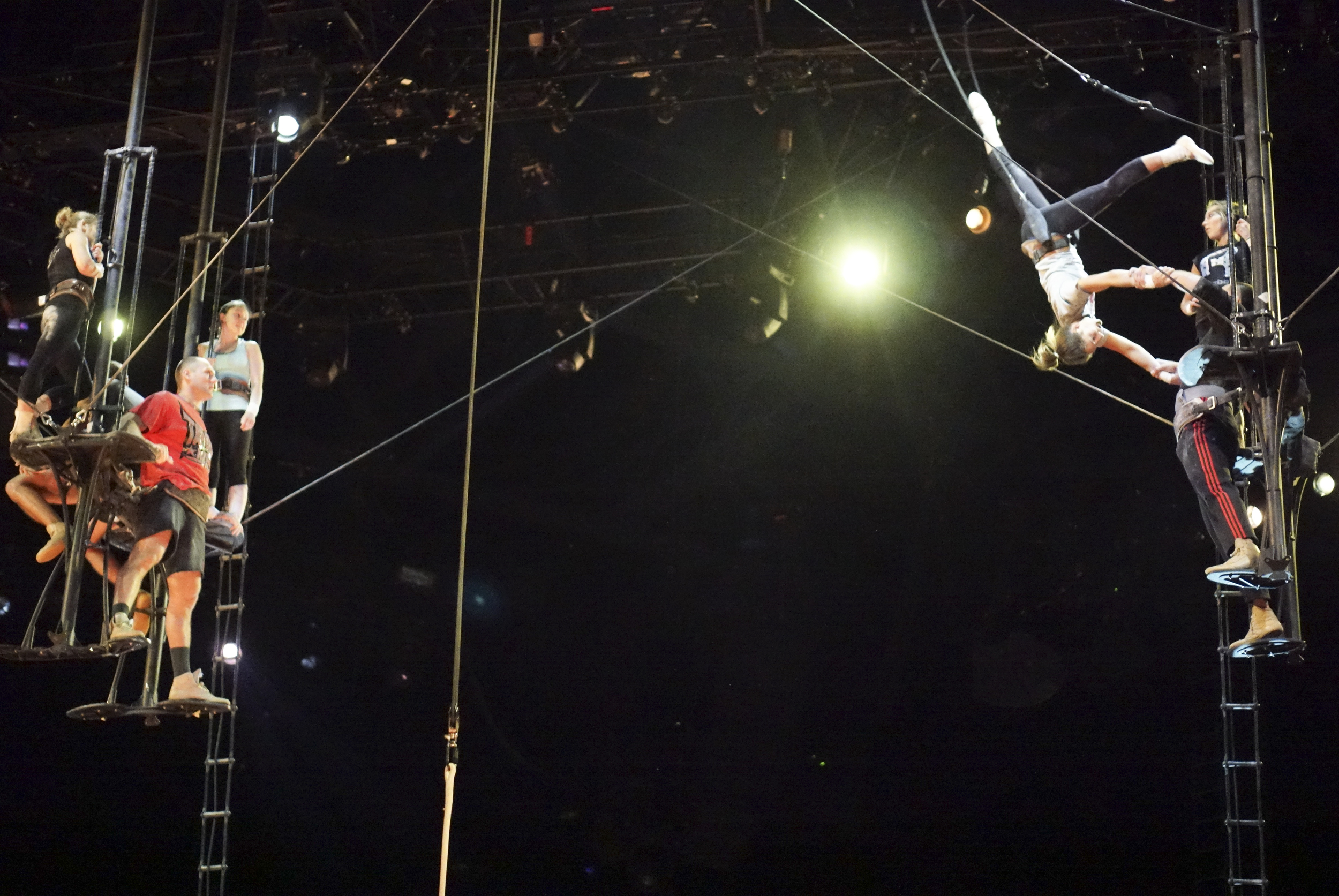 Staff Photo by Dan Henry / The Chattanooga Times Free Press- 7/20/16. Arial performers warm up before the opening night of the OVO Cirque Du Soleil being held at McKenzie arena in Chattanooga, Tenn., July 20-24 2016. The OVO Cirque show features performers as insects in colorful costumes performing acts including foot juggling, hand balancing, rock climbing, acrobatics and slack lining.