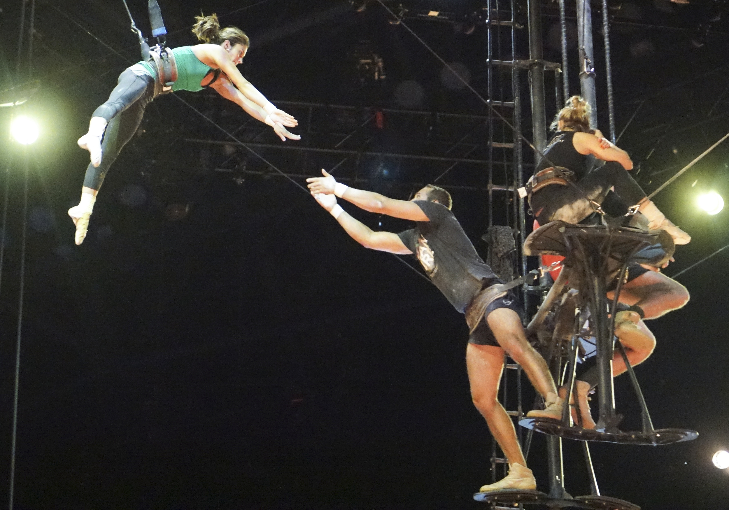 Staff Photo by Dan Henry / The Chattanooga Times Free Press- 7/20/16. Arial performers warm up before the opening night of the OVO Cirque Du Soleil being held at McKenzie arena in Chattanooga, Tenn., July 20-24 2016. The OVO Cirque show features performers as insects in colorful costumes performing acts including foot juggling, hand balancing, rock climbing, acrobatics and slack lining.
