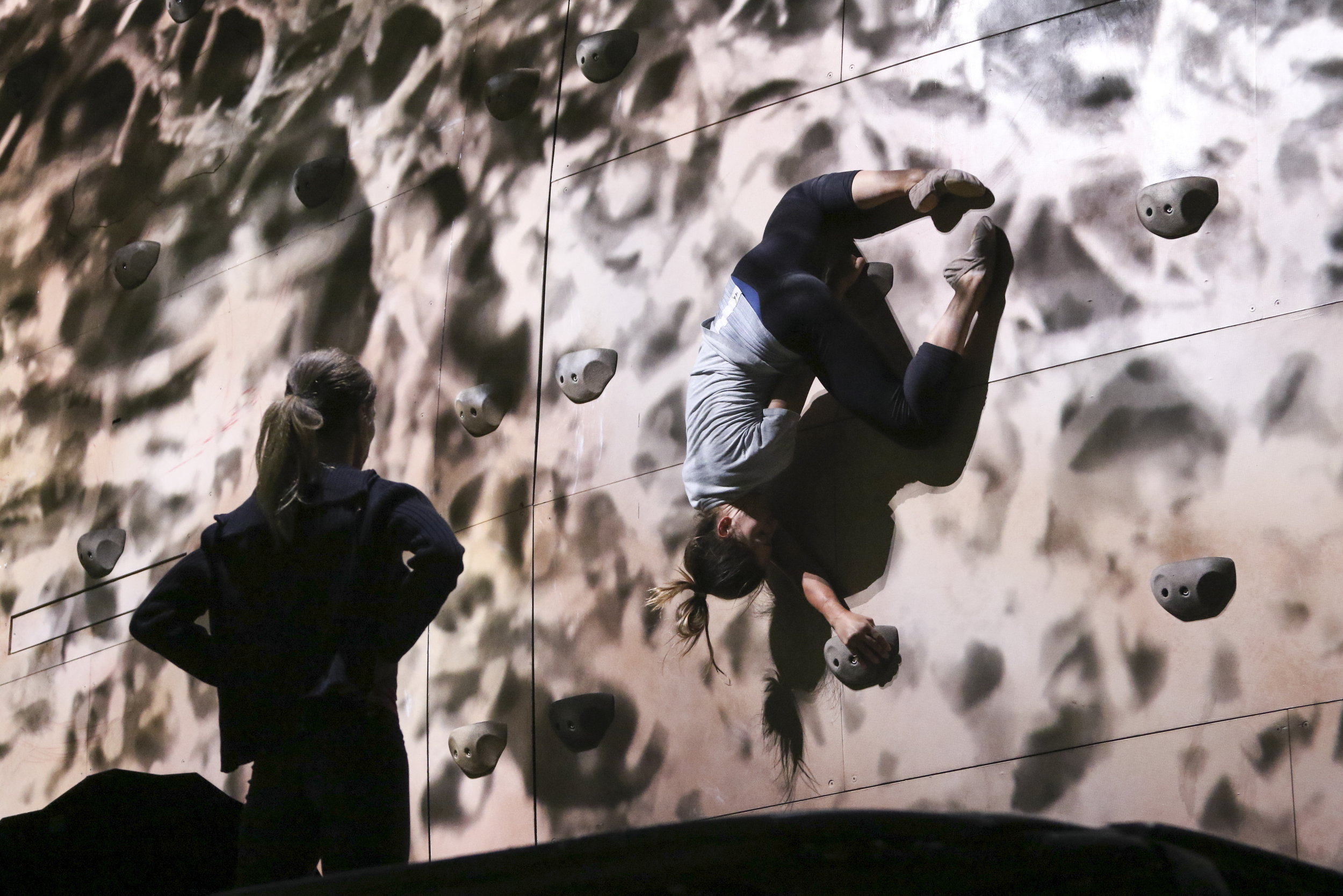Staff Photo by Dan Henry / The Chattanooga Times Free Press- 7/20/16. Aurelie Dauphin, left, aids Camille Santerre as she warms up for her part as a backup spider before the opening night of the OVO Cirque Du Soleil being held at McKenzie arena in Chattanooga, Tenn., July 20-24 2016. The OVO Cirque show features performers as insects in colorful costumes performing acts including foot juggling, hand balancing, rock climbing, acrobatics and slack lining.