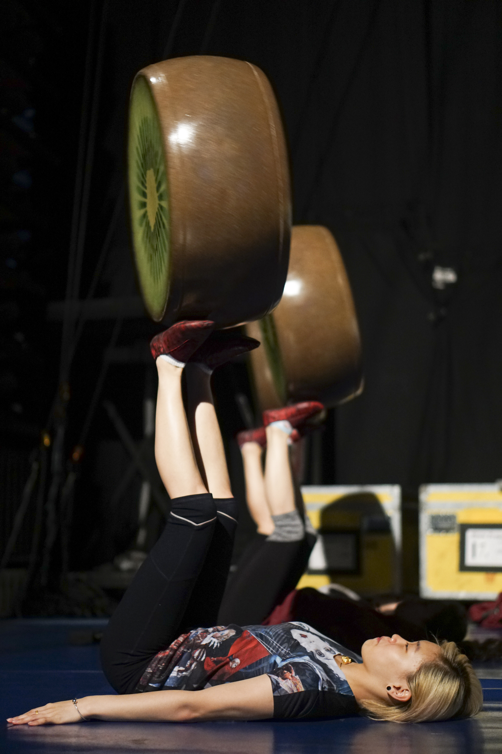 Staff Photo by Dan Henry / The Chattanooga Times Free Press- 7/20/16. Pei Xin and other foot jugglers who will be dressed as ants warm up before the opening night of the OVO Cirque Du Soleil being held at McKenzie arena in Chattanooga, Tenn., July 20-24 2016. The OVO Cirque show features performers as insects in colorful costumes performing acts including foot juggling, hand balancing, rock climbing, acrobatics and slack lining.