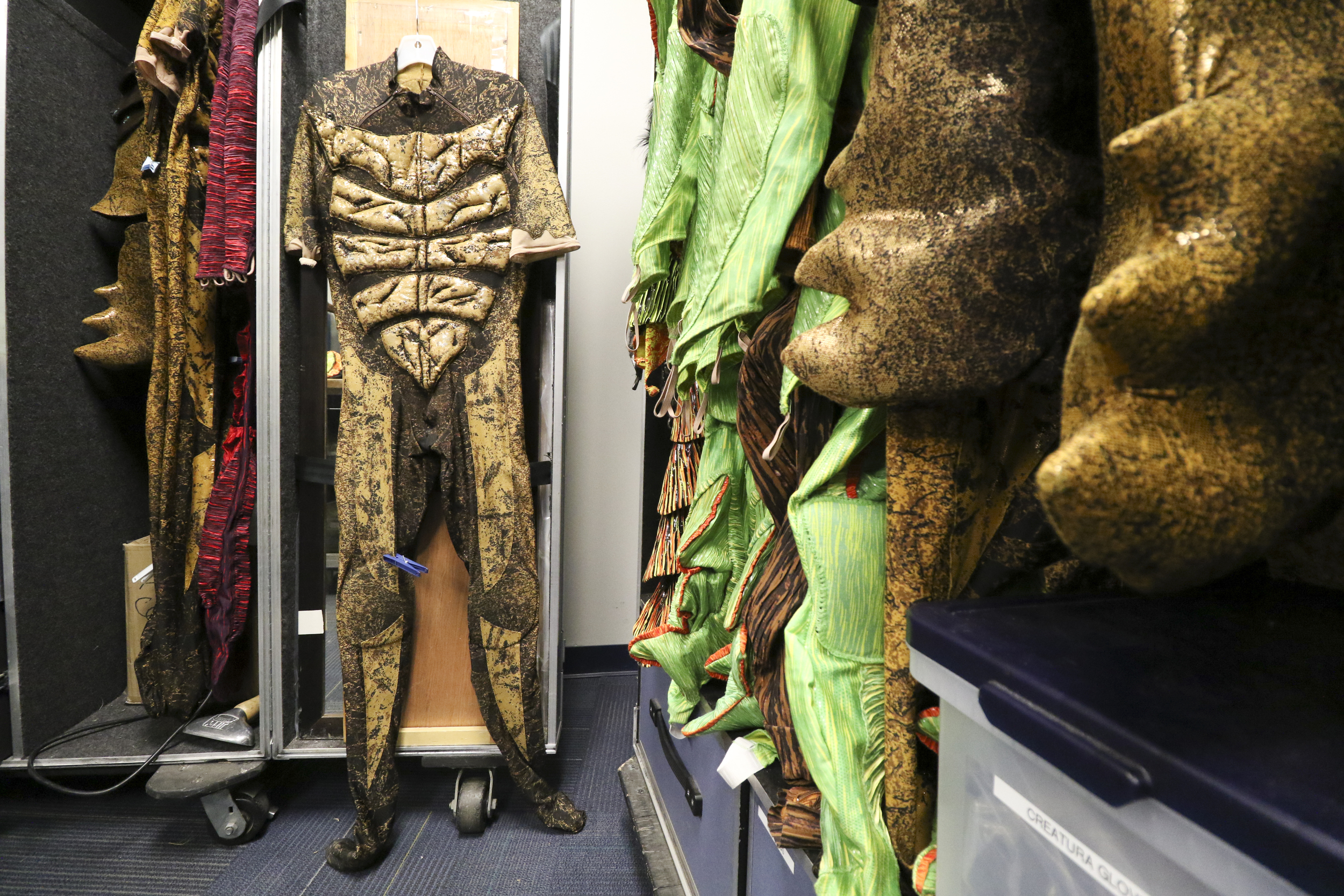 Staff Photo by Dan Henry / The Chattanooga Times Free Press- 7/20/16. Costumes hang in preparation for the opening night of the OVO Cirque Du Soleil being held at McKenzie arena in Chattanooga, Tenn., July 20-24 2016. The OVO Cirque show features performers as insects in colorful costumes performing acts including foot juggling, hand balancing, rock climbing, acrobatics and slack lining.