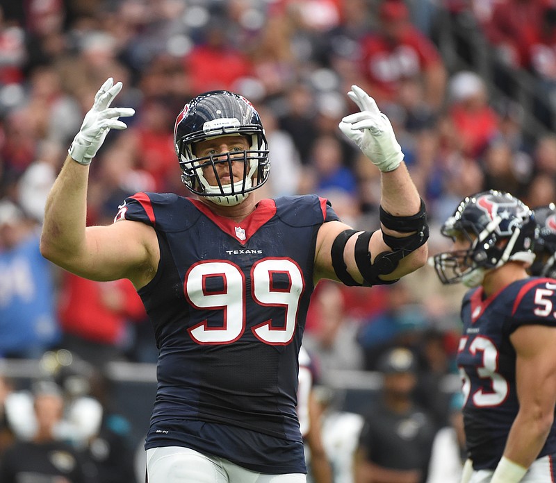 In this Jan. 3, 2016, file photo, Houston Texans defensive end J.J. Watt (99) gestures during the first half of an NFL football game against the Jacksonville Jaguars, in Houston.   (AP Photo/Eric Christian Smith, File)
            