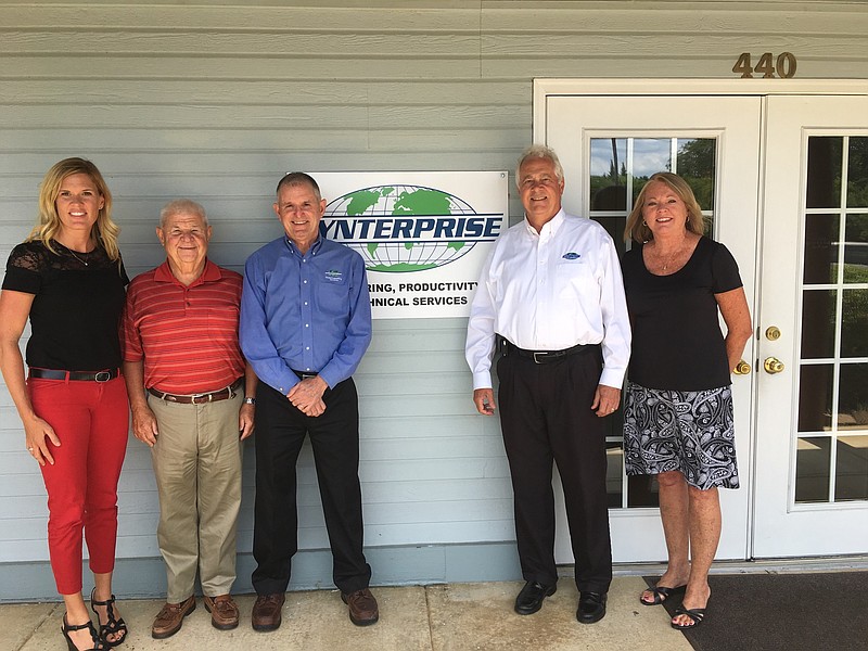 Synterprise staff, from left, Haley Gautreaux, marketing director; Don Brewer, human resources; CEO Michael Brown; Robert Moss, chief operating officer; and Mary Ann Brown, chief financial officer.