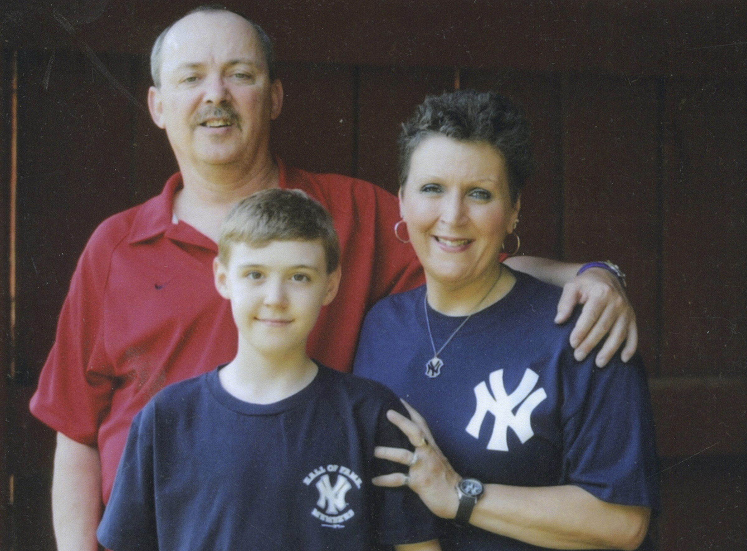 Randy Roberts, left, his wife, Wendy, and their son, Matthew.