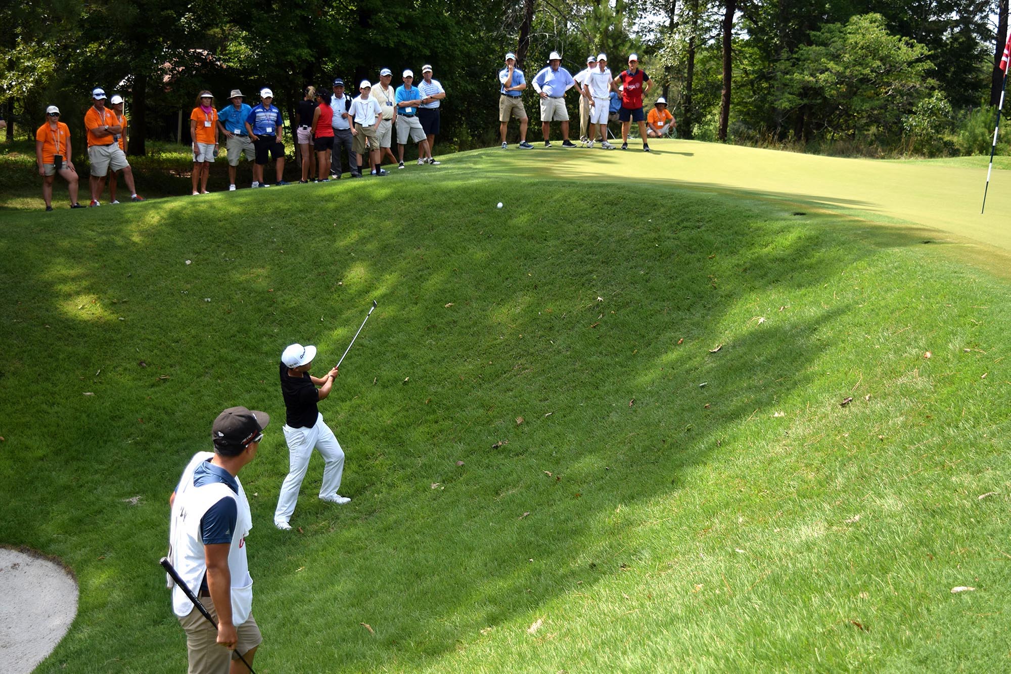 John Pak of Scotch Plains, New Jersey chips up to the 17th hole.  The fifth day of the 69th U.S. Junior Amateur Championship was held at the Honors Course in Ooltewah, Tennessee, Friday July 22, 2016.