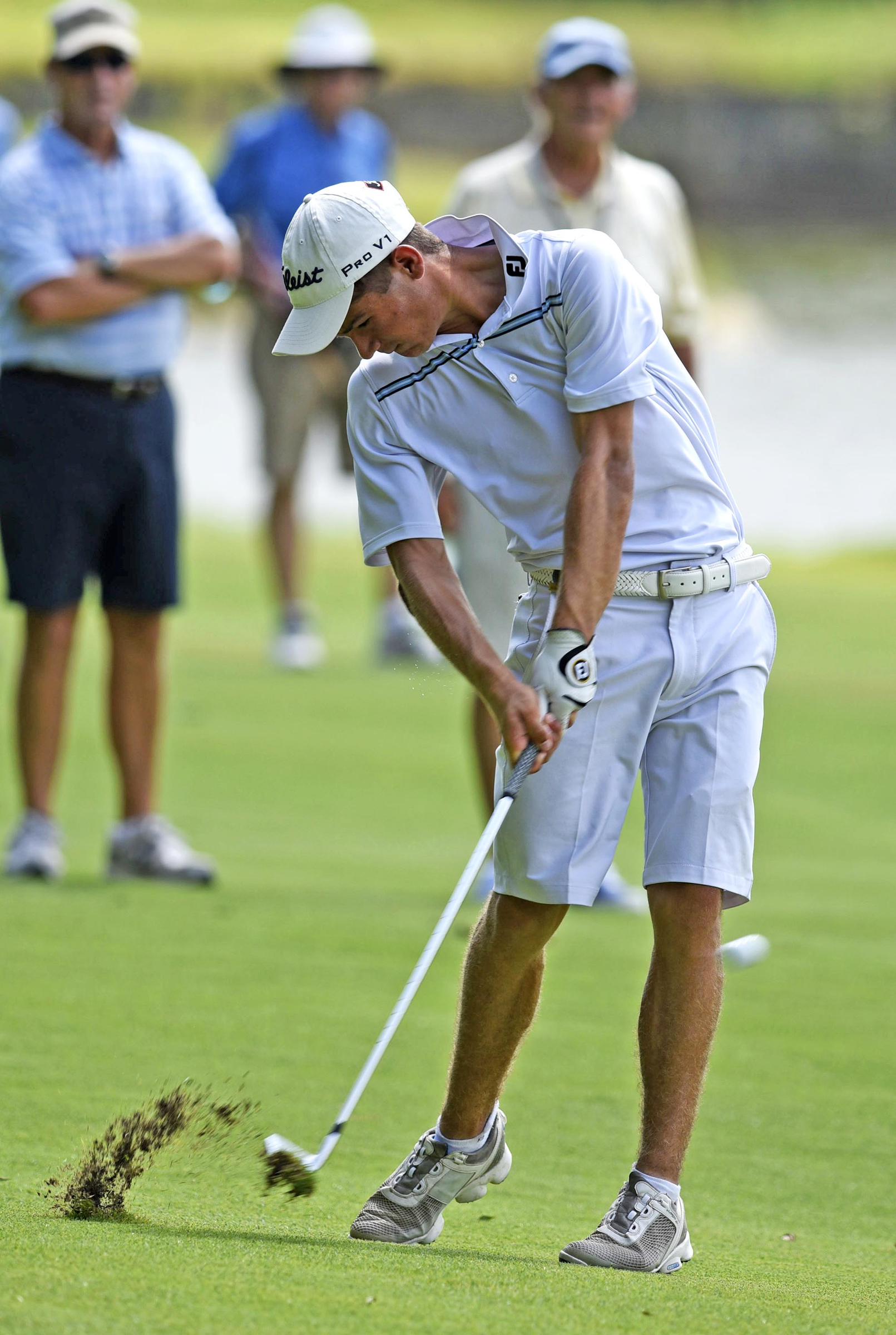 Noah Goodwin of Corinth, Texas hits his second shot on the 15th hole.  Goodwin won his semifinal match over John Pak of Scotch Plains, New Jersey after 20 holes. The fifth day of the 69th U.S. Junior Amateur Championship was held at the Honors Course in Ooltewah, Tennessee, Friday July 22, 2016.