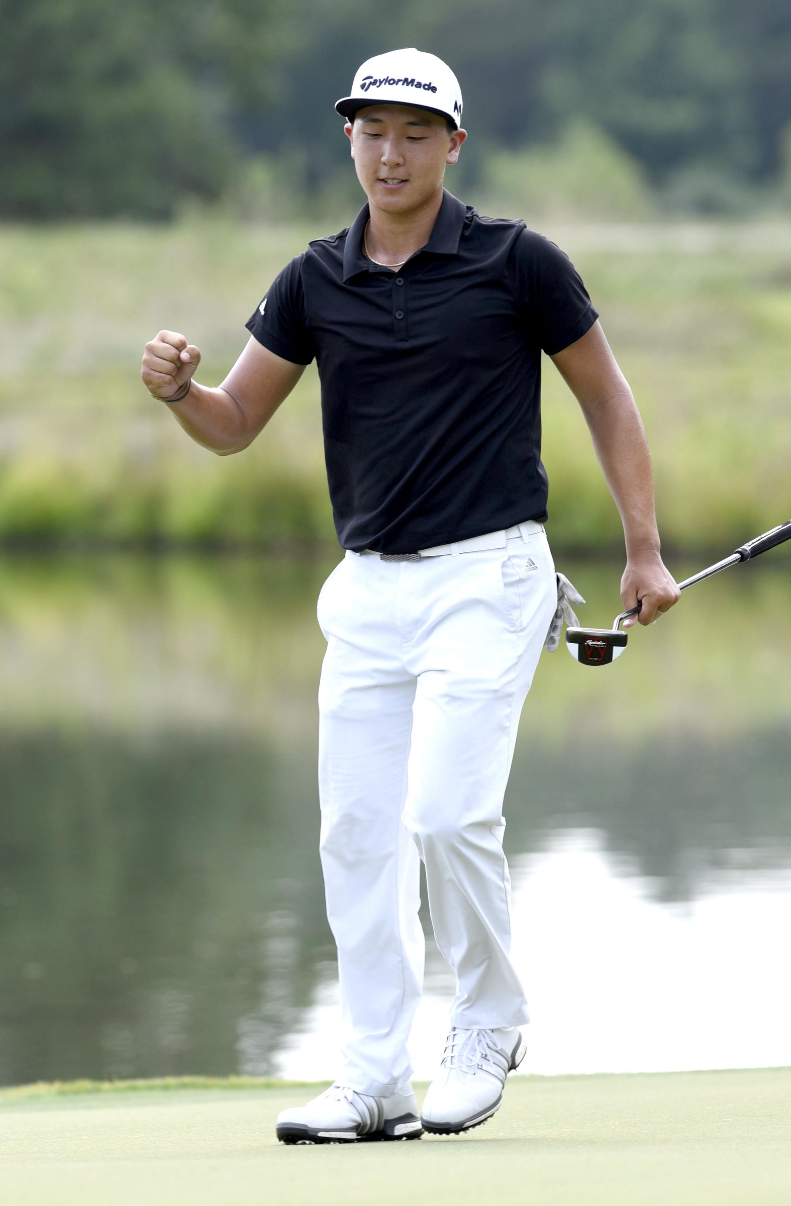 John Pak of Scotch Plains, New Jersey celebrates a put on the 16th hole that would square his match with Noah Goodwin of Corinth, Texas.  The match would remain square until Goodwin defeated Pak on the 20th hole.  The fifth day of the 69th U.S. Junior Amateur Championship was held at the Honors Course in Ooltewah, Tennessee, Friday July 22, 2016.