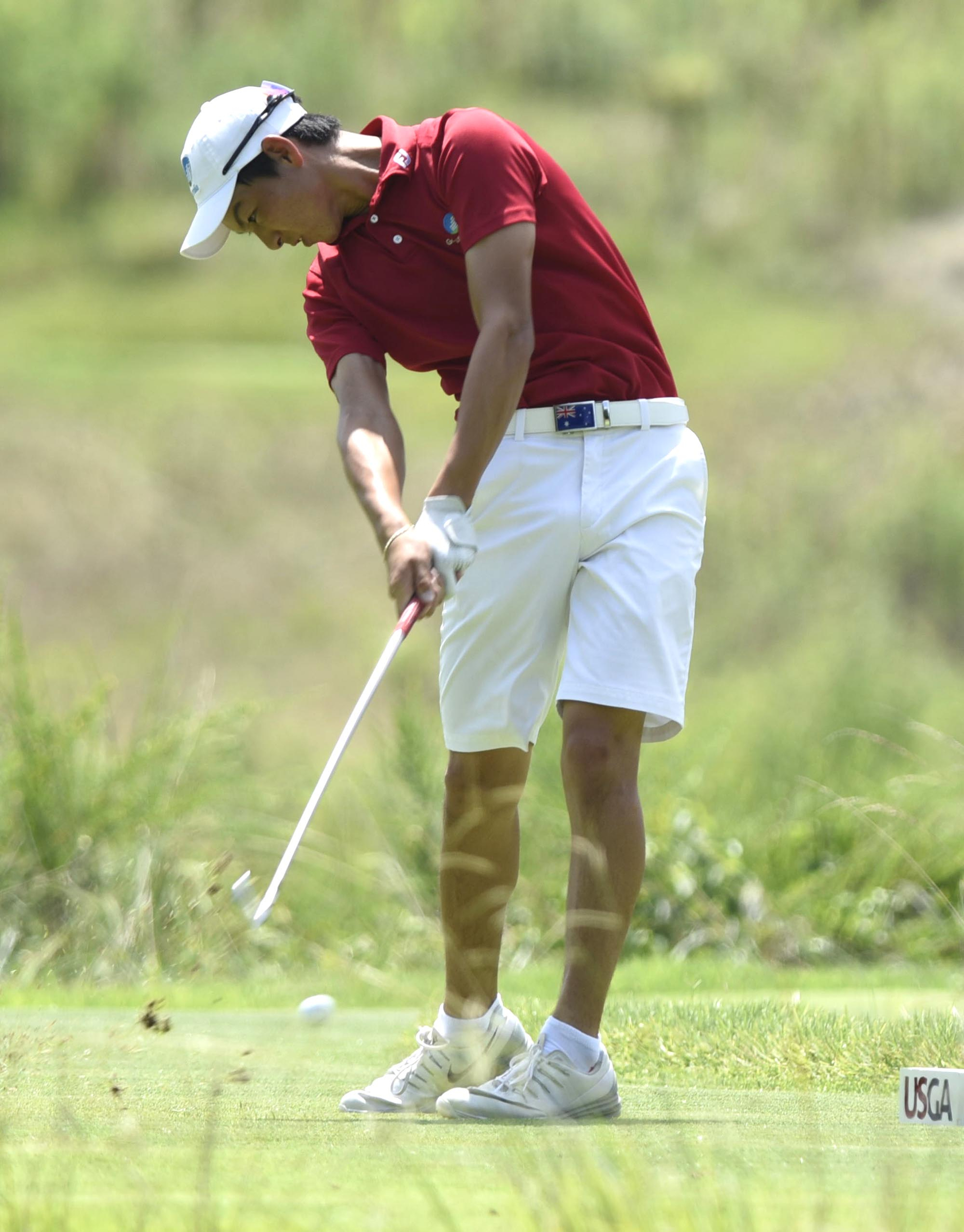 Australia's Min Woo Lee hits his tee shot on the 9th hole.  Lee defeated Eugene Hong of Sanford, Florida 1 up in their semifinal match.  The fifth day of the 69th U.S. Junior Amateur Championship was held at the Honors Course in Ooltewah, Tennessee, Friday July 22, 2016.