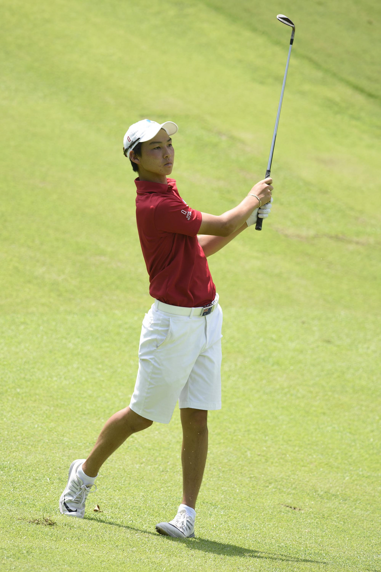 Australia's Min Woo Lee hits his second shot on the 9th hole.  Lee defeated Eugene Hong of Sanford, Florida 1 up in their semifinal match.  The fifth day of the 69th U.S. Junior Amateur Championship was held at the Honors Course in Ooltewah, Tennessee, Friday July 22, 2016.