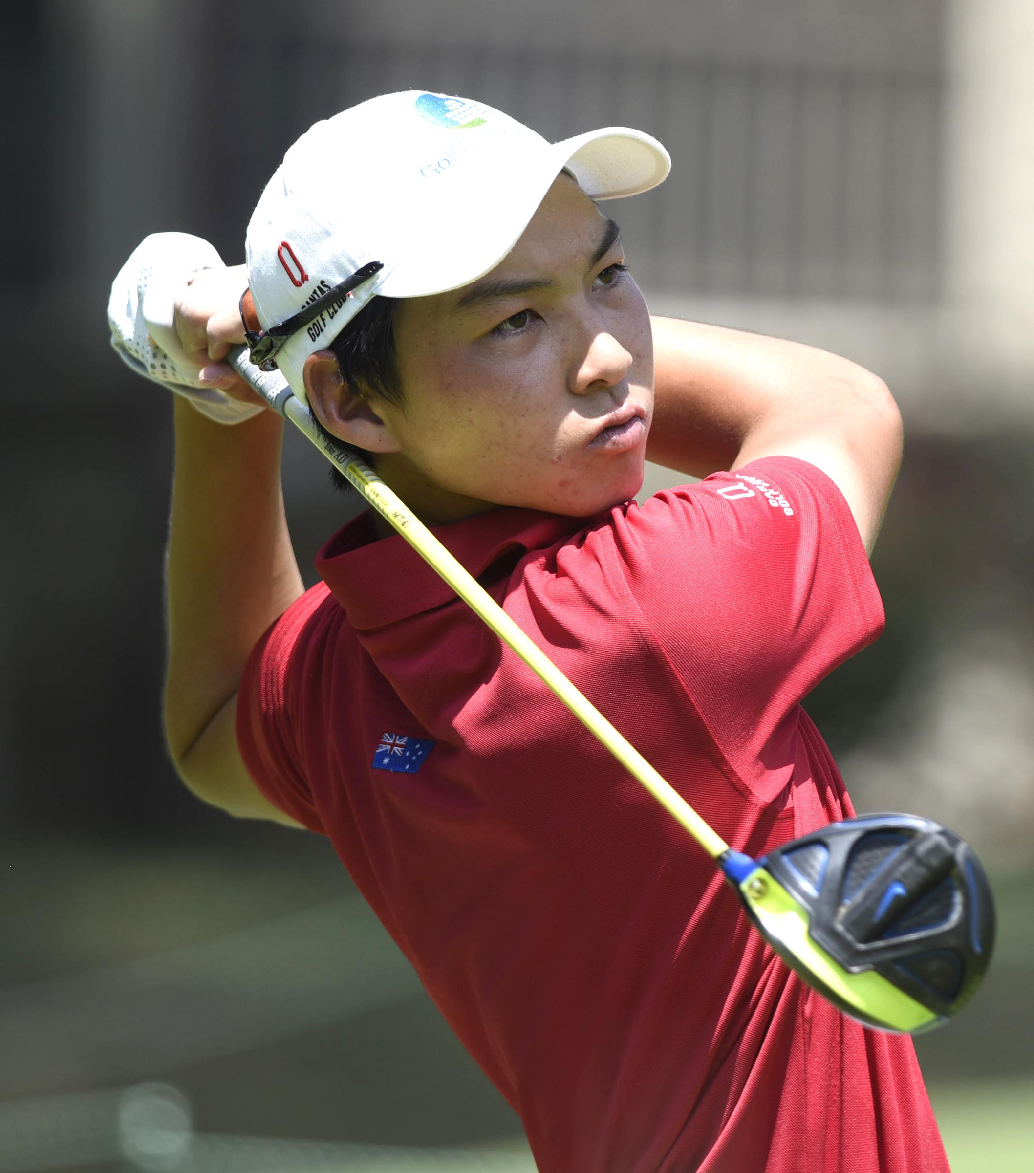 Australia's Min Woo Lee watches his tee shot on the 10th hole.  Lee defeated Eugene Hong of Sanford, Florida 1 up in their semifinal match.  The fifth day of the 69th U.S. Junior Amateur Championship was held at the Honors Course in Ooltewah, Tennessee, Friday July 22, 2016.
