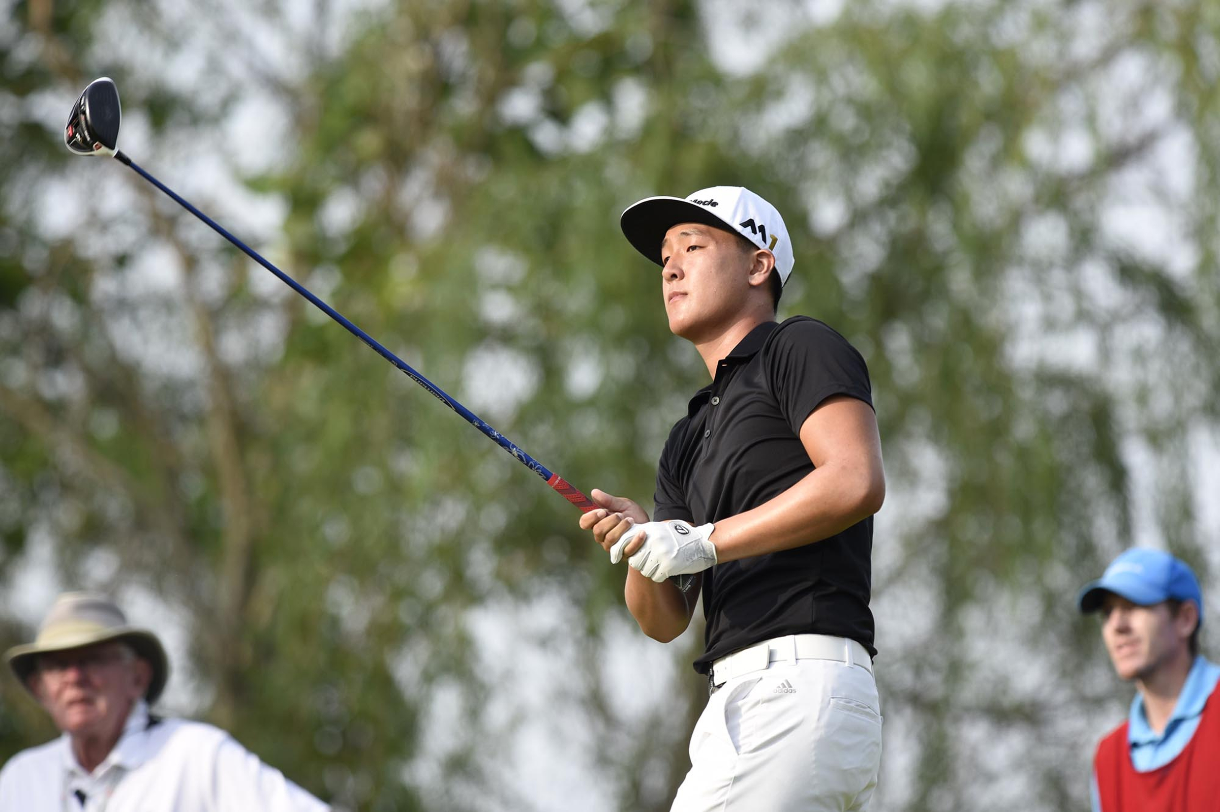 John Pak of Scotch Plains, New Jersey ties off on the 5th hole in his quarterfinal watch with Won Jun Lee of the Republic of Korea 1 up.  The fifth day of the 69th U.S. Junior Amateur Championship was held at the Honors Course in Ooltewah, Tennessee, Friday July 22, 2016.