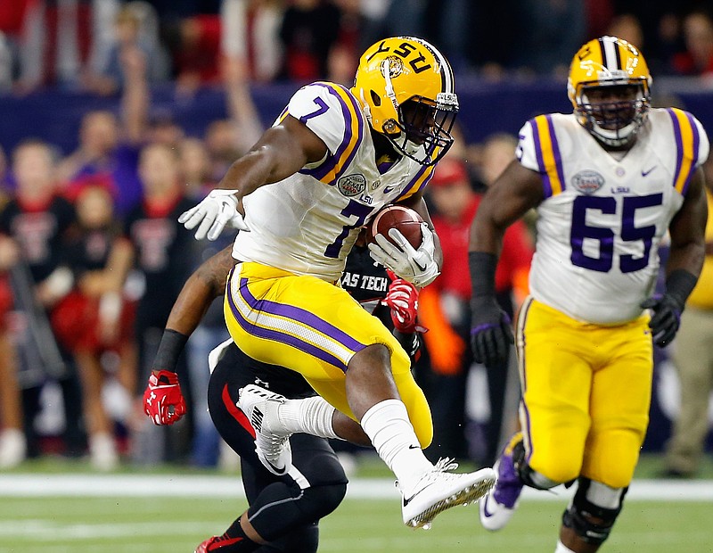 LSU running back Leonard Fournette (7) rushes against Texas Tech during the first half of the Texas Bowl NCAA football game Tuesday, Dec. 29, 2015, in Houston. LSU won 56-27. (AP Photo/Bob Levey)