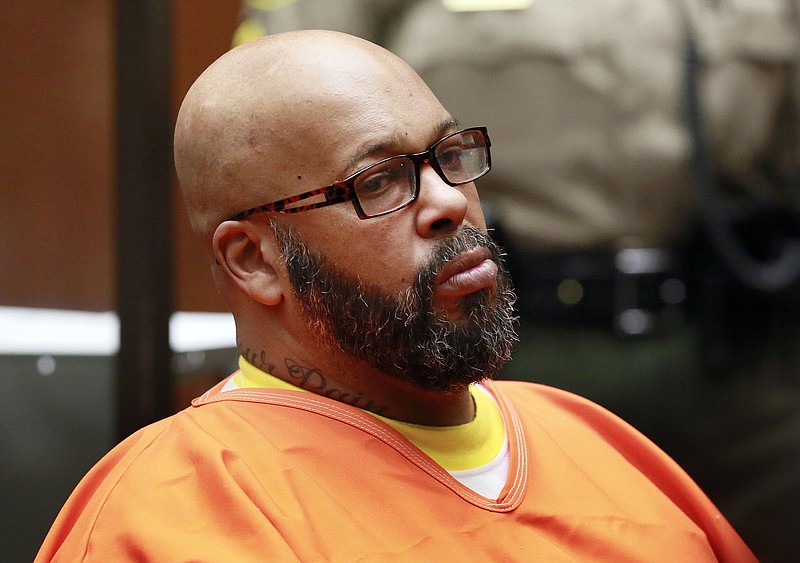 
              FILE - In this July 17, 2015 file photo, Marion "Suge" Knight sits in court during a bail hearing in his murder case, in Los Angeles. Knight is scheduled to return to a Los Angeles courtroom on Friday, July 22, 2016, for a hearing in which his attorneys will ask that prosecutors hand over information about witnesses in a murder case against the Death Row Records co-founder. Prosecutors do not want to release certain info about the witnesses, citing Knight's history of violence. (AP Photo/Nick Ut, File)
            