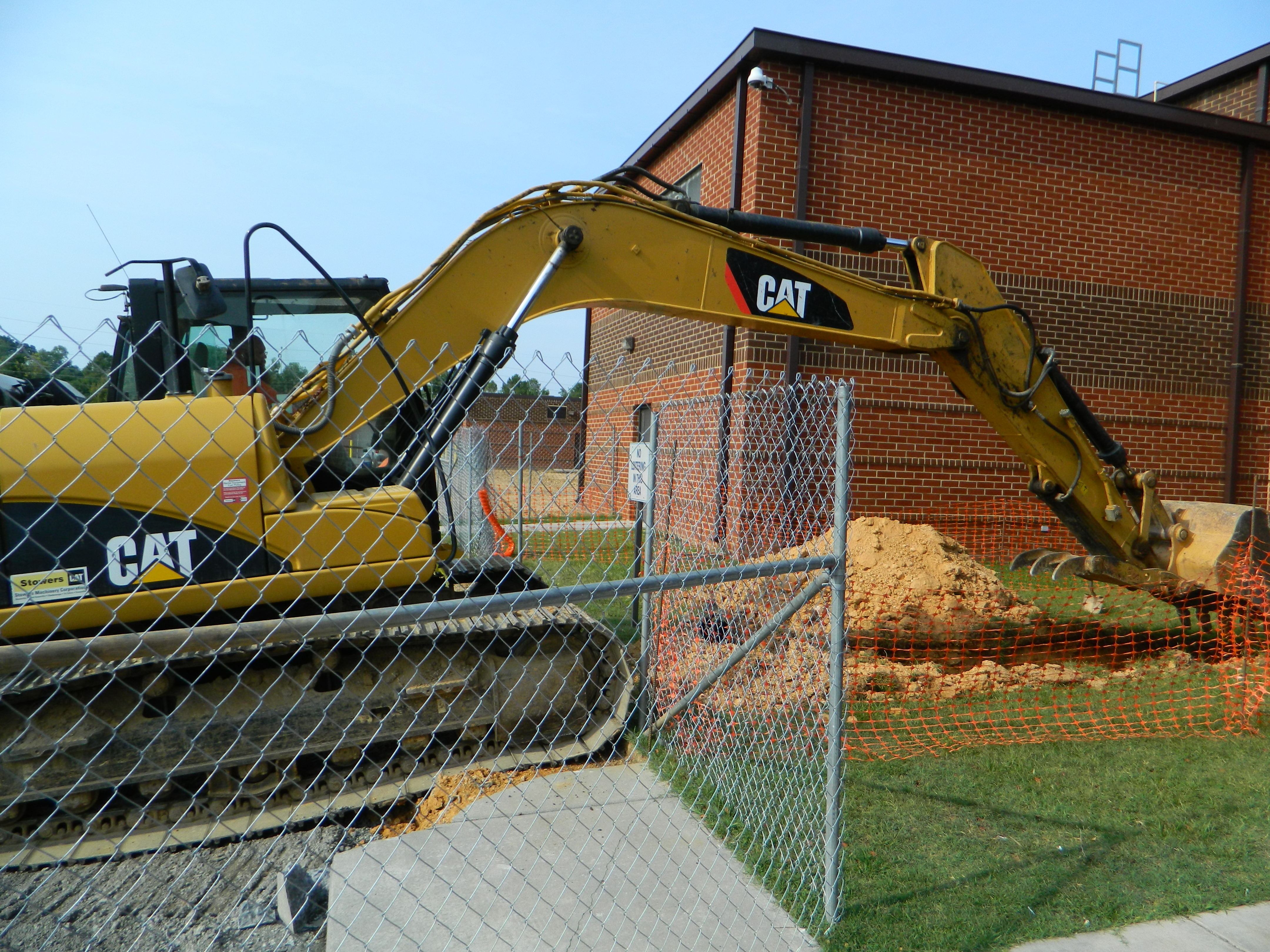 PHOTO BY PAUL LEACH Workers dig a new drainage line as part of ground preparation for the new Brian K. Smith Workhouse Facility, located on the grounds of the Bradley County Judicial Complex in Cleveland, Tenn.