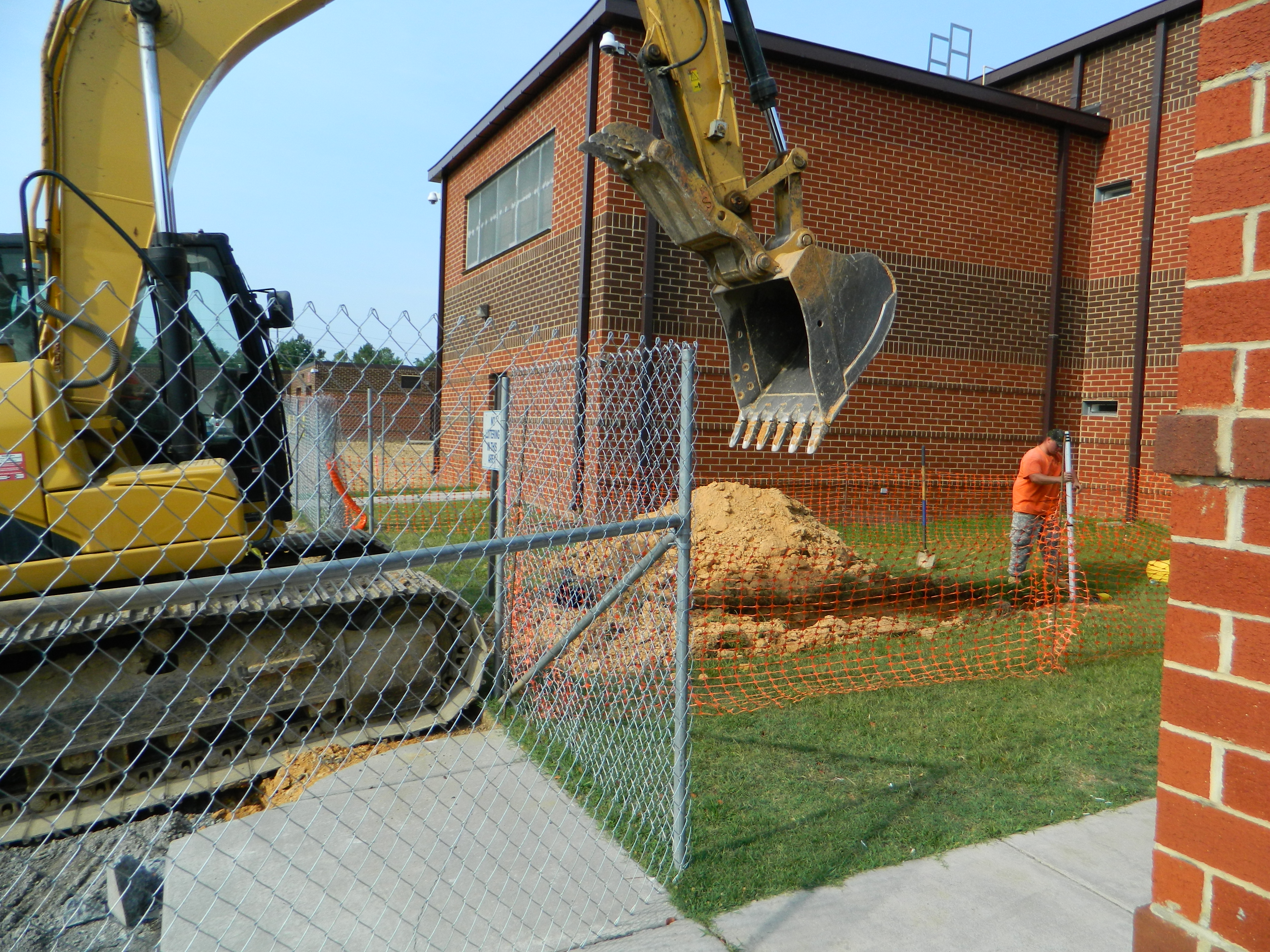 PHOTO BY PAUL LEACH Workers dig a new drainage line as part of ground preparation for the new Brian K. Smith Workhouse Facility, located on the grounds of the Bradley County Judicial Complex in Cleveland, Tenn.