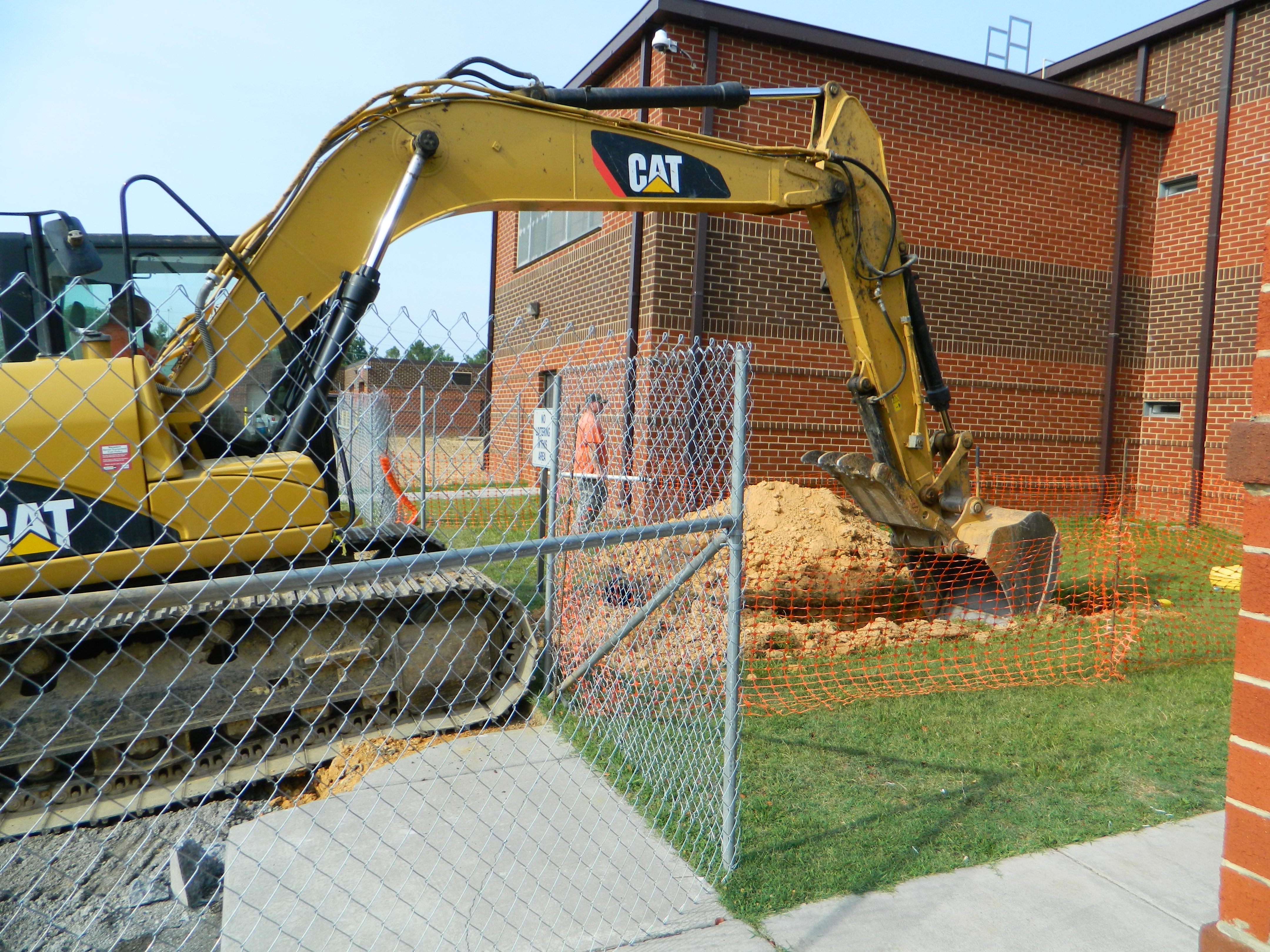 PHOTO BY PAUL LEACH Workers dig a new drainage line as part of ground preparation for the new Brian K. Smith Workhouse Facility, located on the grounds of the Bradley County Judicial Complex in Cleveland, Tenn.