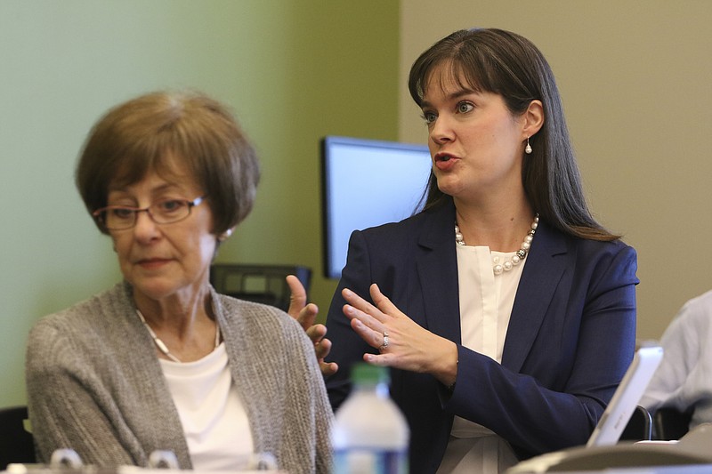 Staff Photo by Dan Henry / The Chattanooga Times Free Press- 7/21/16. Commissioner Candice McQueen, right, speaks during a Tennessee State Board of Education meeting at the University of Tennessee at Chattanooga library on Thursday, July 21, 2016. 