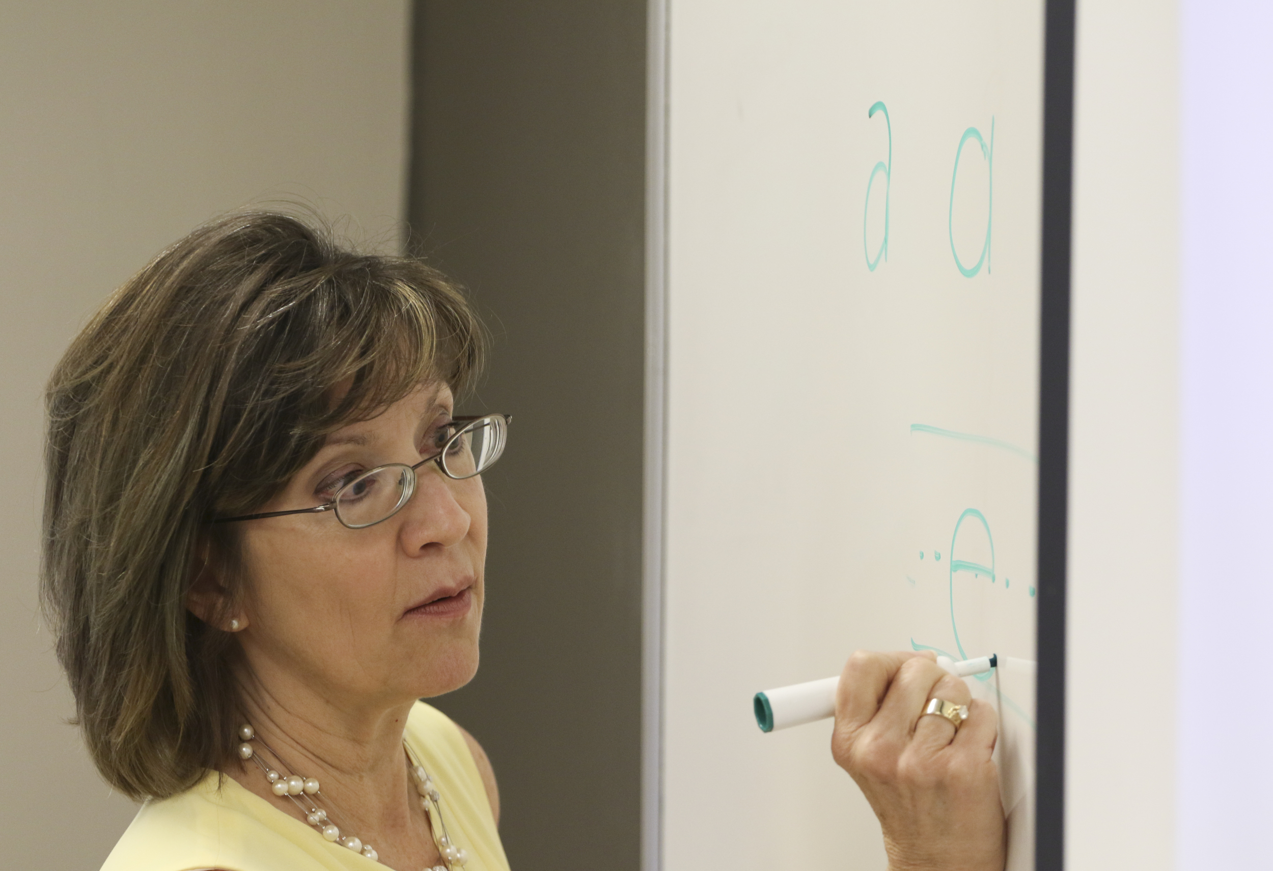 Staff Photo by Dan Henry / The Chattanooga Times Free Press- 7/21/16. Dr. Sarah Sandefur speaks with students about emergent literacy while at the University of Tennessee at Chattanooga on Thursday, July 21, 2016.
