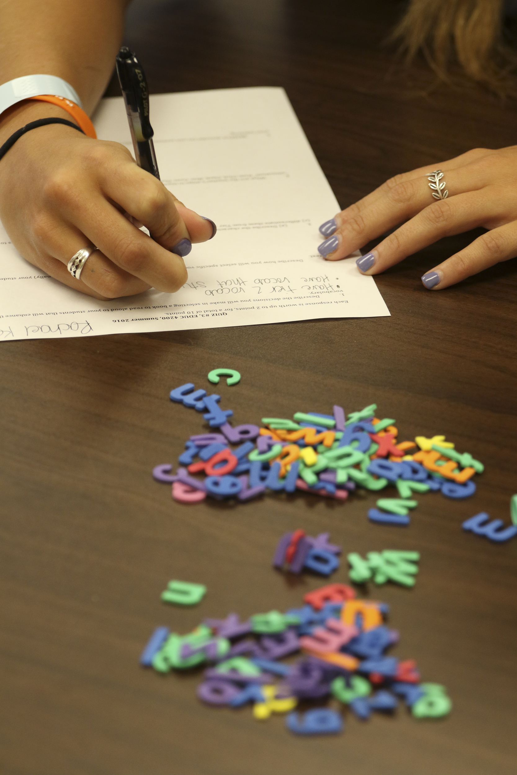 Staff Photo by Dan Henry / The Chattanooga Times Free Press- 7/21/16. Students work on a "Rainbow Writing" exercise as Dr. Sarah Sandefur speaks about emergent literacy while at the University of Tennessee at Chattanooga on Thursday, July 21, 2016.