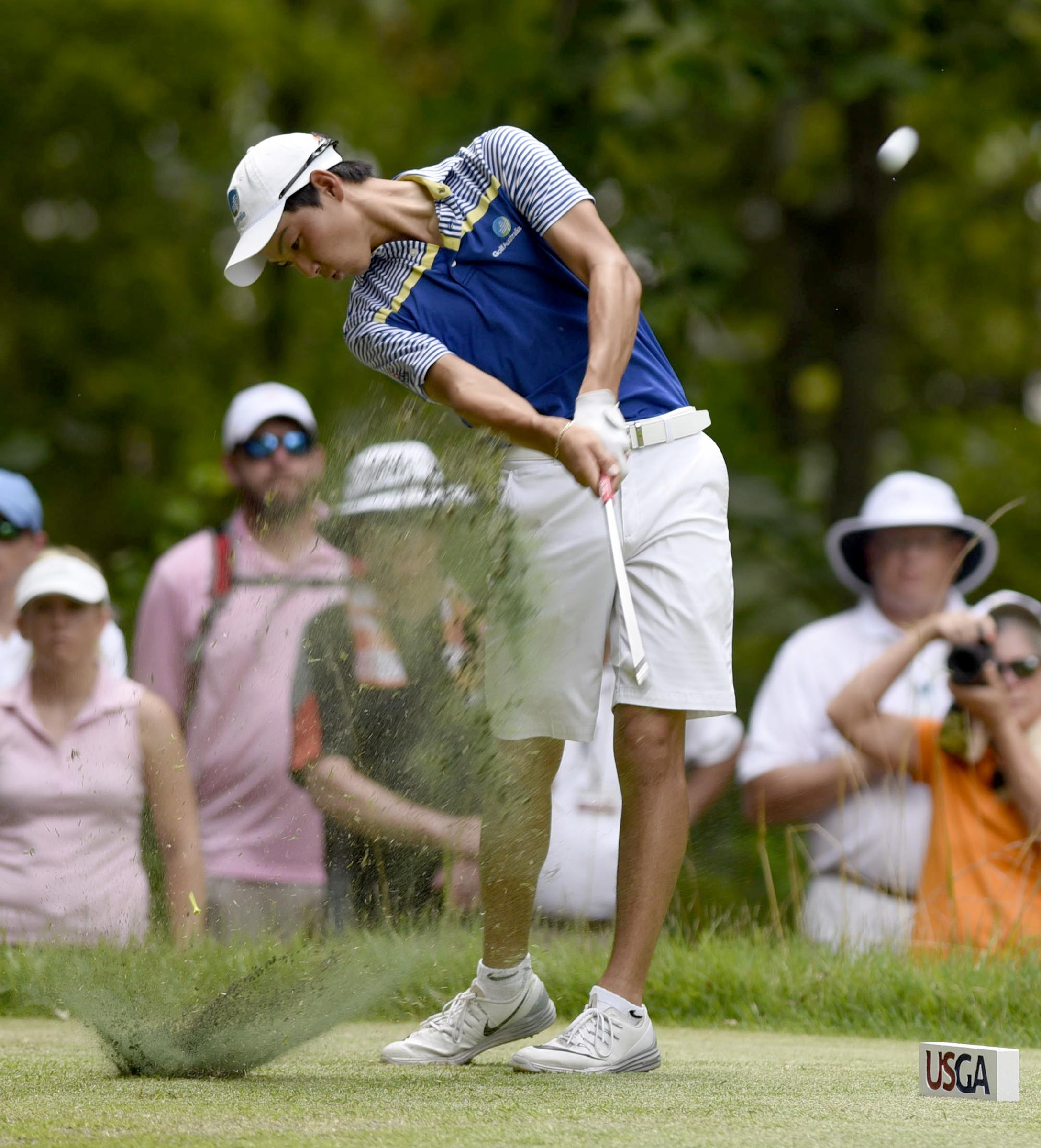 Australia's Min Woo Lee hits his tee shot on the 32 hole of the championship match.  The final day of the 69th U.S. Junior Amateur Championship was held at the Honors Course in Ooltewah, Tennessee, Saturday July 23, 2016.