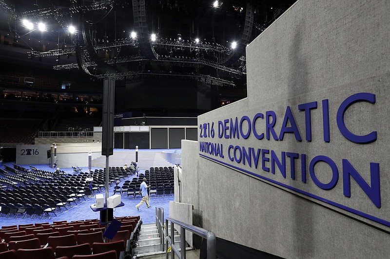 
              Work continues inside the convention hall before the Democratic National Convention, Saturday, July 23, 2016, in Philadelphia. (AP Photo/Alex Brandon)
            