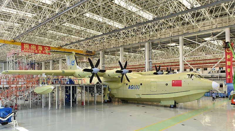 
              In this Saturday, July 23, 2016 photo released by Xinhua News Agency, the Amphibious aircraft AG600 rolls off a production line in Zhuhai, south China's Guangdong Province. The Xinhua News Agency China said China unveiled the world's largest amphibious aircraft that Beijing plans to use for marine missions and fighting forest fires on Saturday. It measures 37 meters (121 feet) in length with a wingspan of 39 meters (128 feet).  (Xinhua/Liang Xu/Xinhua via AP) NO SALES
            