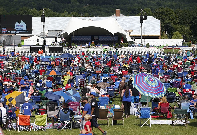 
              Fans wait for the start of the National Baseball Hall of Fame induction ceremony at the Clark Sports Center on Sunday, July 24, 2016, in Cooperstown, N.Y. Former players Mike Piazza and Ken Griffey Jr. will be inducted. (AP Photo/Mike Groll)
            