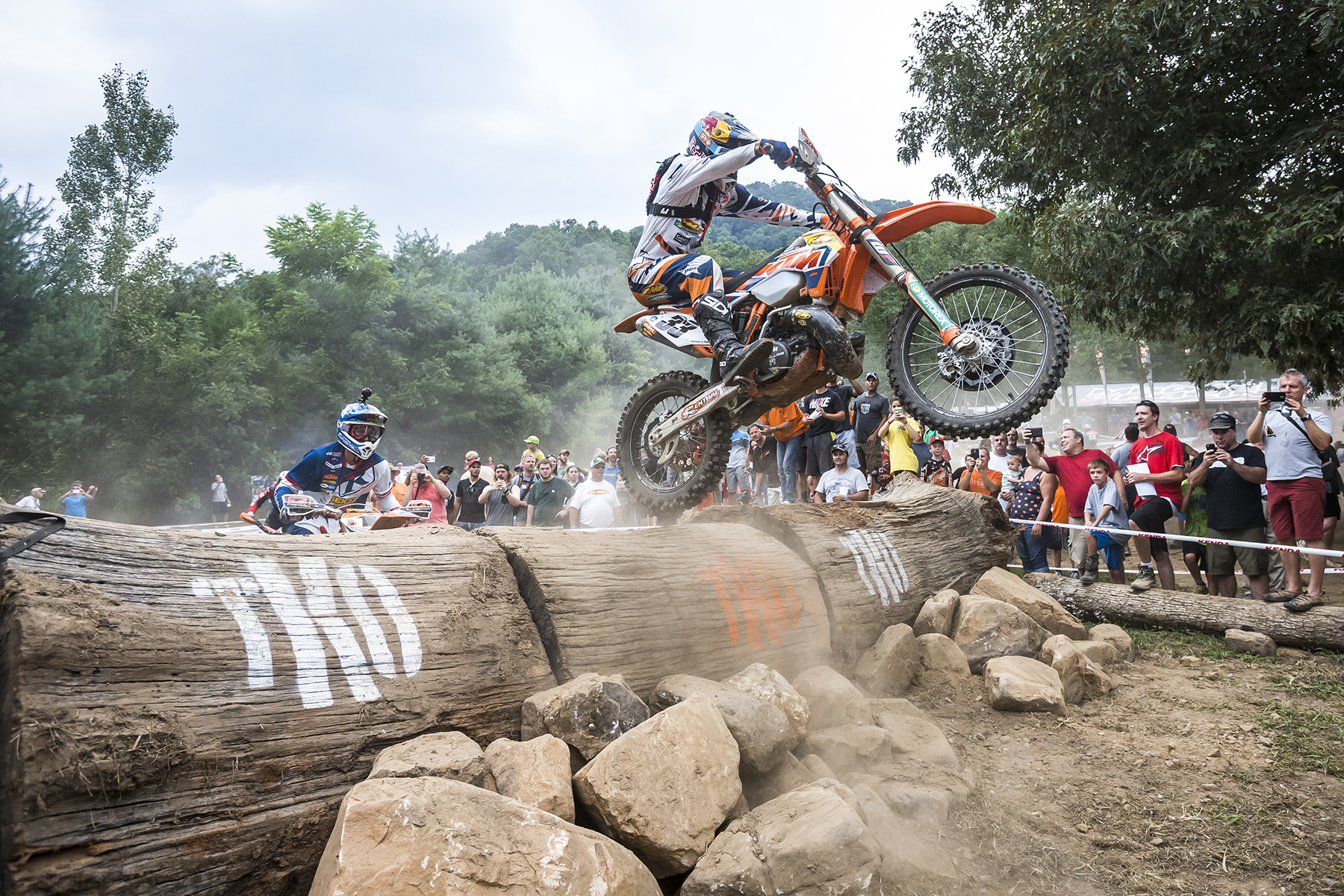 Taylor Robert accelerates over an obstacle with Cody Webb in hot pursuit.