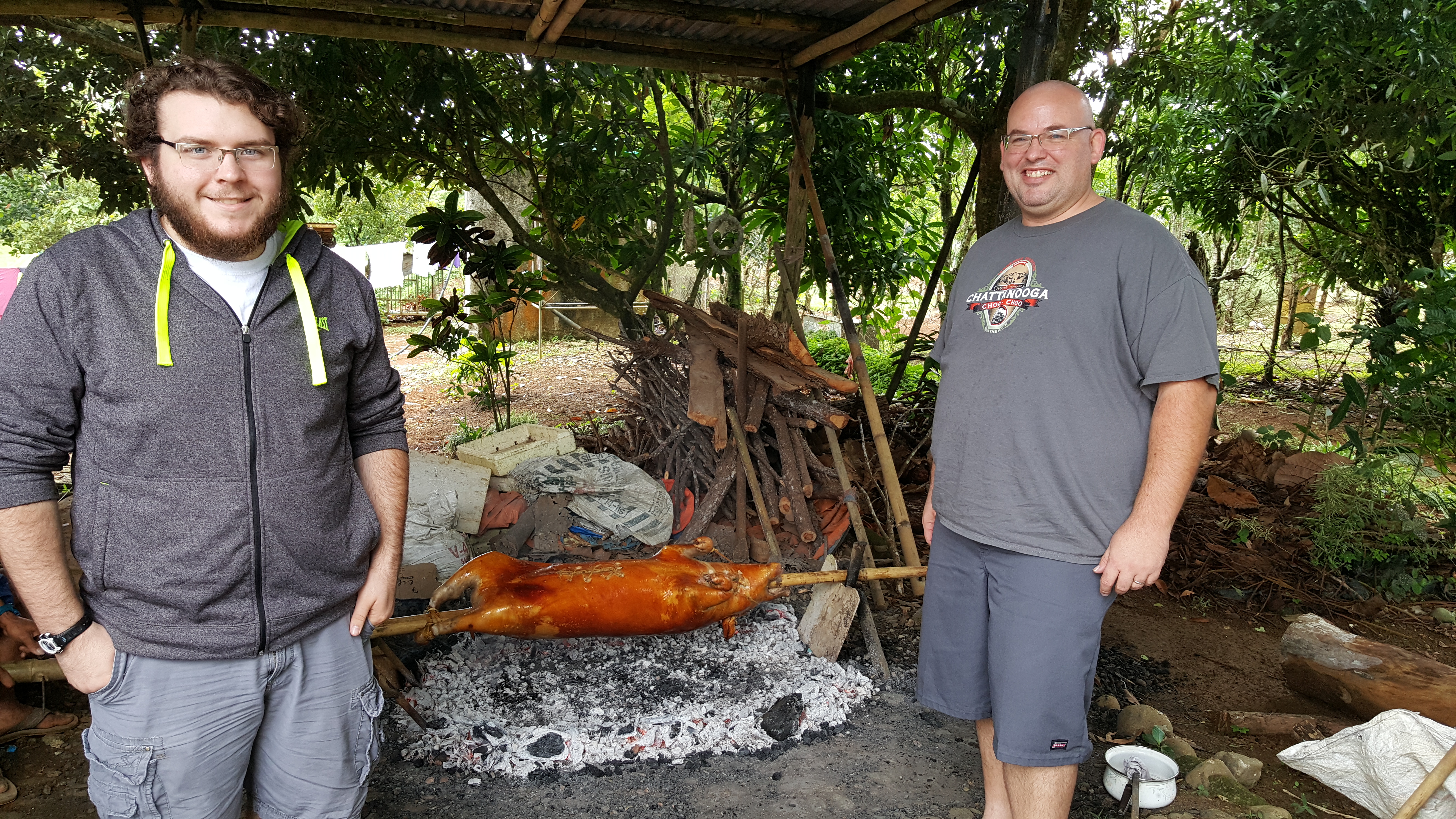 Jason Jones and his son, Tyler, roast a lechon while vacationing in the Philippines where Jason's wife (Tyler's stepmom) Annalyn was born and raised. The lechon is a favorite at Filipino feasts where it is roasted over coals for four hours. Now Chattanoogans can taste lechon at an August feast of the Filipino-American Association of Greater Chattanooga.