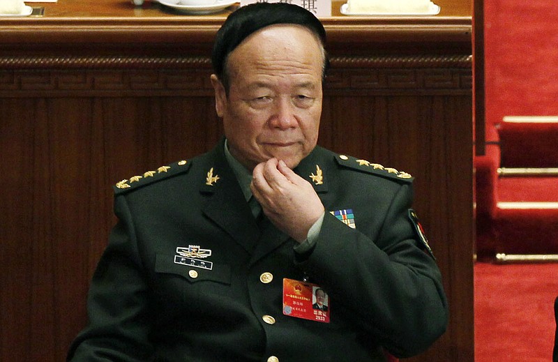 
              FILE - In this March 9, 2012, file photo, China's People's Liberation Army Gen. Guo Boxiong attends a session of the National People's Congress in Beijing. A Chinese military court on Monday, July 25, 2016, sentenced Guo Boxiong to life in prison for taking bribes, concluding China's highest-level prosecution of a military figure in decades. (AP Photo/Ng Han Guan, File)
            