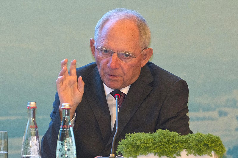 
              Germany's Federal Minister of Finance Wolfgang Schauble speaks on stage at the High-level Tax Symposium held in Chengdu in Southwestern China's Sichuan province, Saturday, July 23, 2016. Finance ministers and Central Bank governors of the 20 most developed economies are to meet in the southwestern city of Chengdu ahead of a G20 leaders meeting in September hosted by China. (AP Photo/Ng Han Guan, Pool)
            