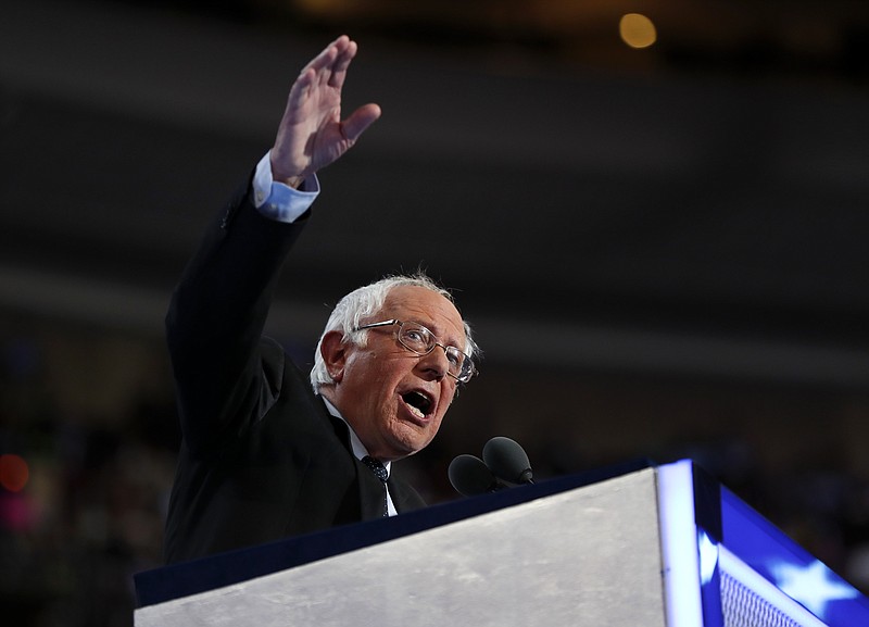 
              Former Democratic Presidential candidate, Sen. Bernie Sanders, I-Vt., speaks during the first day of the Democratic National Convention in Philadelphia , Monday, July 25, 2016. (AP Photo/Carolyn Kaster)
            