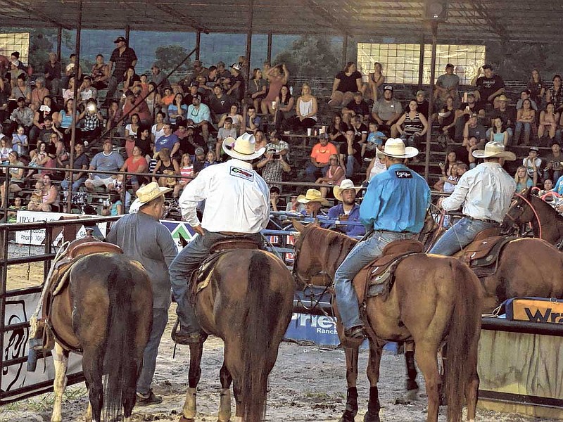 Cowboys get ready to ride their horses into the ring for the calf-roping competition. NFL Films created a segment on the rodeo's specialty act "Wild Thang" (Tim Lepard and Team Ghost Riders) at this year's rodeo.