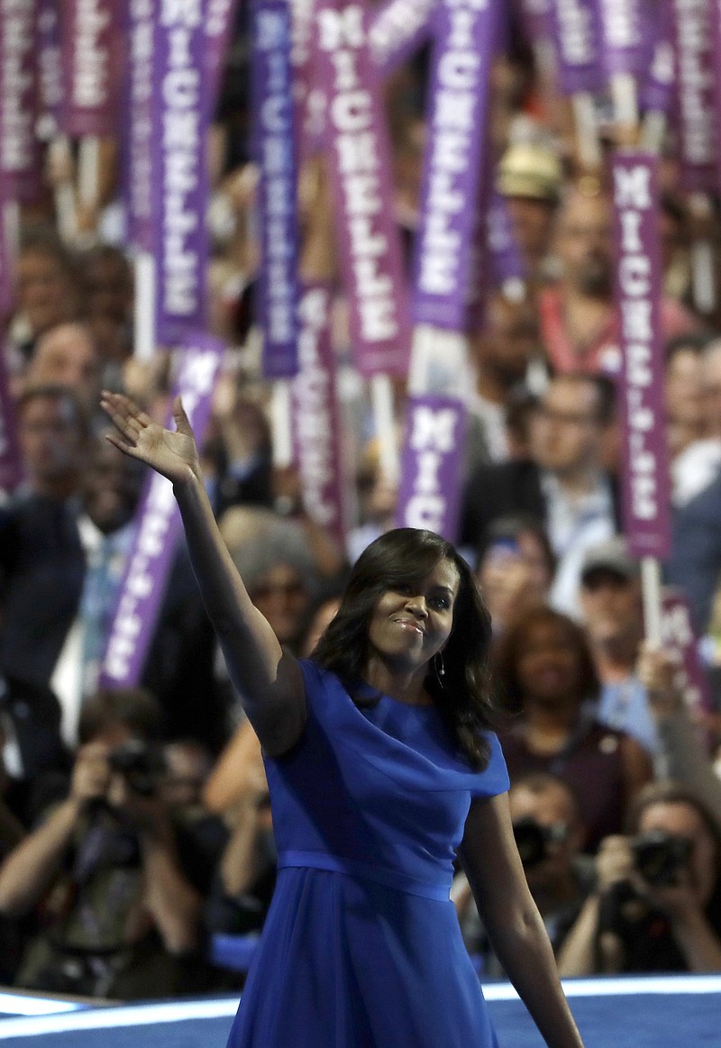 
              First Lady Michelle Obama speaks to delegates during the first day of the Democratic National Convention in Philadelphia , Monday, July 25, 2016. (AP Photo/Matt Rourke)
            