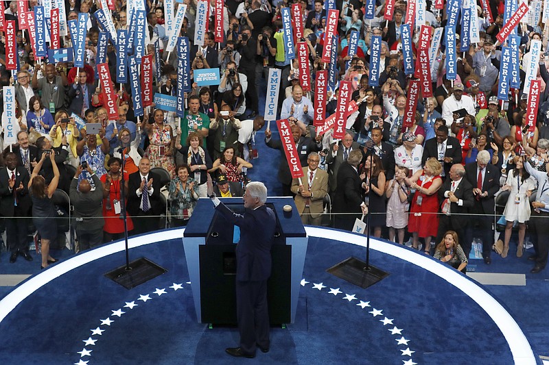 Former President Bill Clinton waves to delegates before speaking during the second day of the Democratic National Convention in Philadelphia on Tuesday, July 26, 2016.