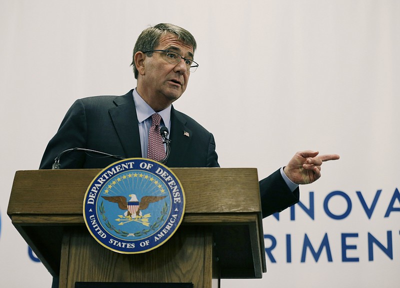 
              FILE - In this July 26, 2016 file photo, Defense Secretary Ash Carter speaks during a news conference in Cambridge, Mass. The U.S. is exploiting an enormous amount of digital information about the Islamic State obtained by Syrian rebels fighting for control of the city of Manbij. (AP Photo/Elise Amendola)
            