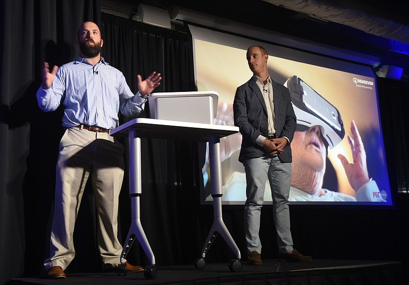 Reed Hayes, left, and Dennis Lally make their pitch for their company, Rendever, Wednesday, July 27, 2016 at Gigtank365's Pitch Night at the Edney Innovation Center.