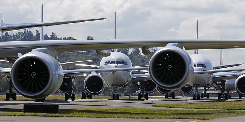 
              FILE - In this Friday, July 15, 2016, file photo, Boeing 7-series passenger airplanes sit parked in a lineup formation during an event marking the 100th Anniversary of the Boeing Co., in Seattle. On Wednesday, July 27, 2016, Boeing reports financial results. (AP Photo/Ted S. Warren, File)
            