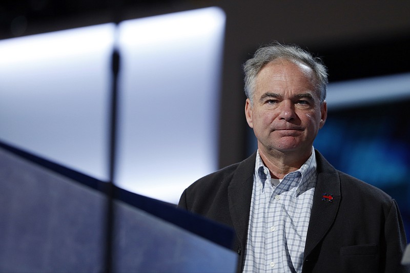 
              Democratic Vice Presidential candidate, Sen. Tim Kaine, D-Va., looks over the podium as he checks out the stage before the start of the third day session of the Democratic National Convention in Philadelphia, Wednesday, July 27, 2016. (AP Photo/Carolyn Kaster)
            