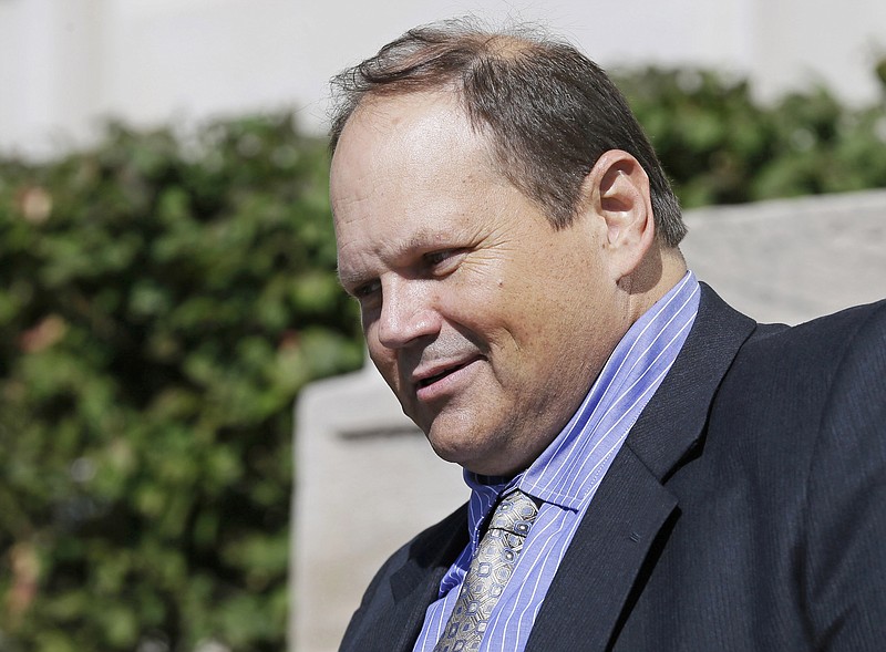 
              FILE - In this Sept. 9, 2015, file photo, former Multi-State Lottery Association security director Eddie Tipton leaves the Polk County Courthouse in Des Moines, Iowa, after his sentencing in a jackpot-fixing scandal. On Wednesday, July 27, 2016, the Iowa Court of Appeals reversed a portion of the fraud convictions of Tipton, who is accused of fixing a Hot Lotto game in Iowa in 2010, but upheld a second conviction. (AP Photo/Charlie Neibergall, File)
            
