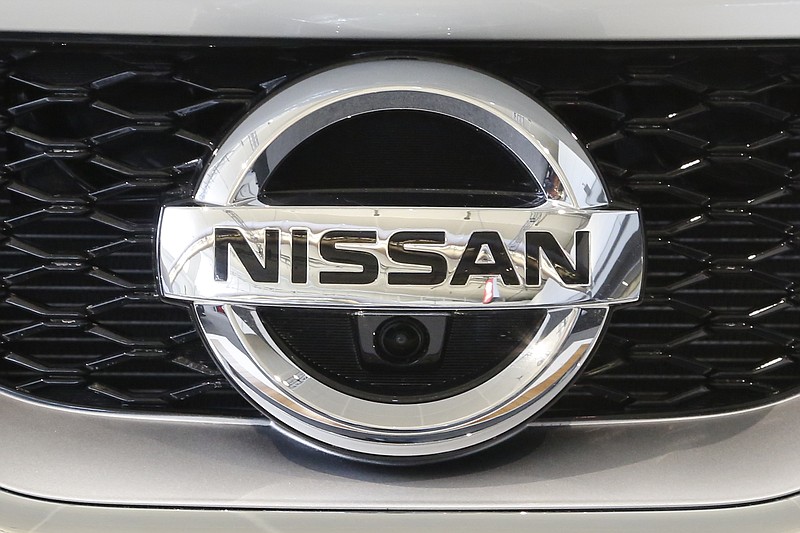 
              This Feb. 11, 2016, photo shows a Nissan emblem on a 2016 Nissan automobile at the Pittsburgh International Auto Show in Pittsburgh. Japanese automaker Nissan Motor Co. is reporting a 136.4 billion yen ($30.7 million) profit for the fiscal quarter through June, down nearly 11 percent from the same period a year ago. (AP Photo/Gene J. Puskar)
            