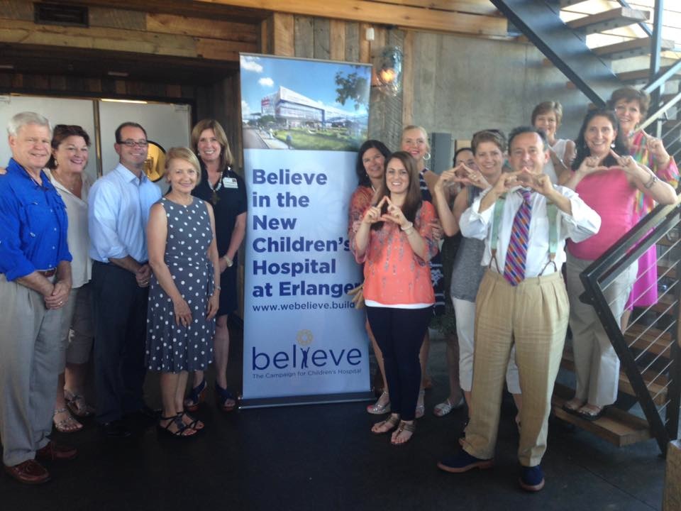 The Chattanooga alumnae chapter of Delta Delta Delta sorority recently made a $1,262 donation to the Believe Campaign for Children's Hospital at Erlanger. The donation was raised through a June fundraiser at Flying Squirrel Bar in which the restaurant donated 10 percent of the evening's sales, money that was matched by the Lamp Post Group. Tri-Delt alumnae make the presentation to Jan Cooper, second from left, Erlanger Health Foundation director of development, and Jed Mescon, front right, Erlanger Health System vice president of marketing, public relations and development.