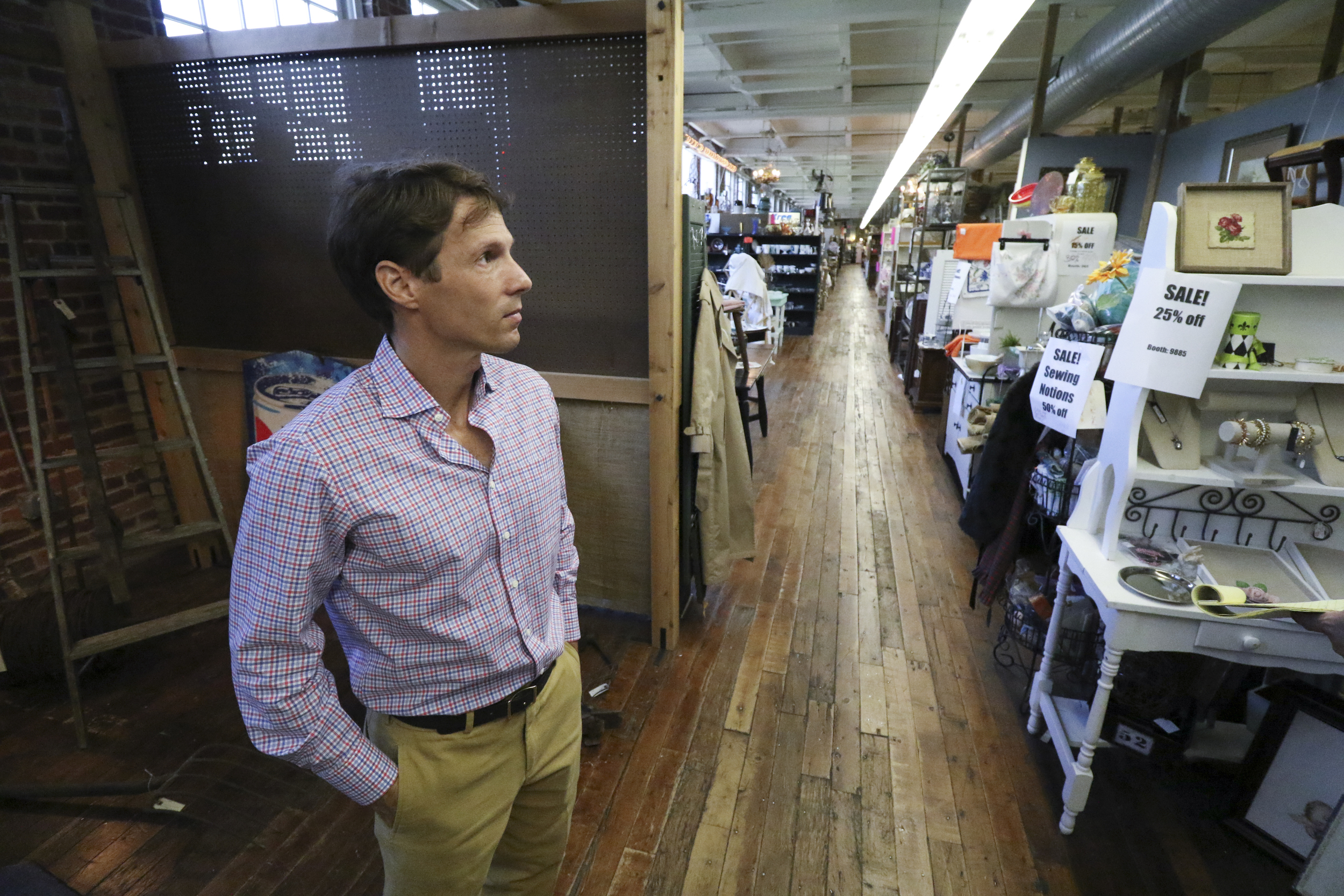 Staff Photo by Dan Henry / The Chattanooga Times Free Press- 7/27/16. David Woodbery, developer and owner of the future Signal Mill office and retail development, speaks about his recent acquisition of the building where Knitting Mill Antiques currently resides and what he plans to do to it on Wednesday, July 27, 2016.