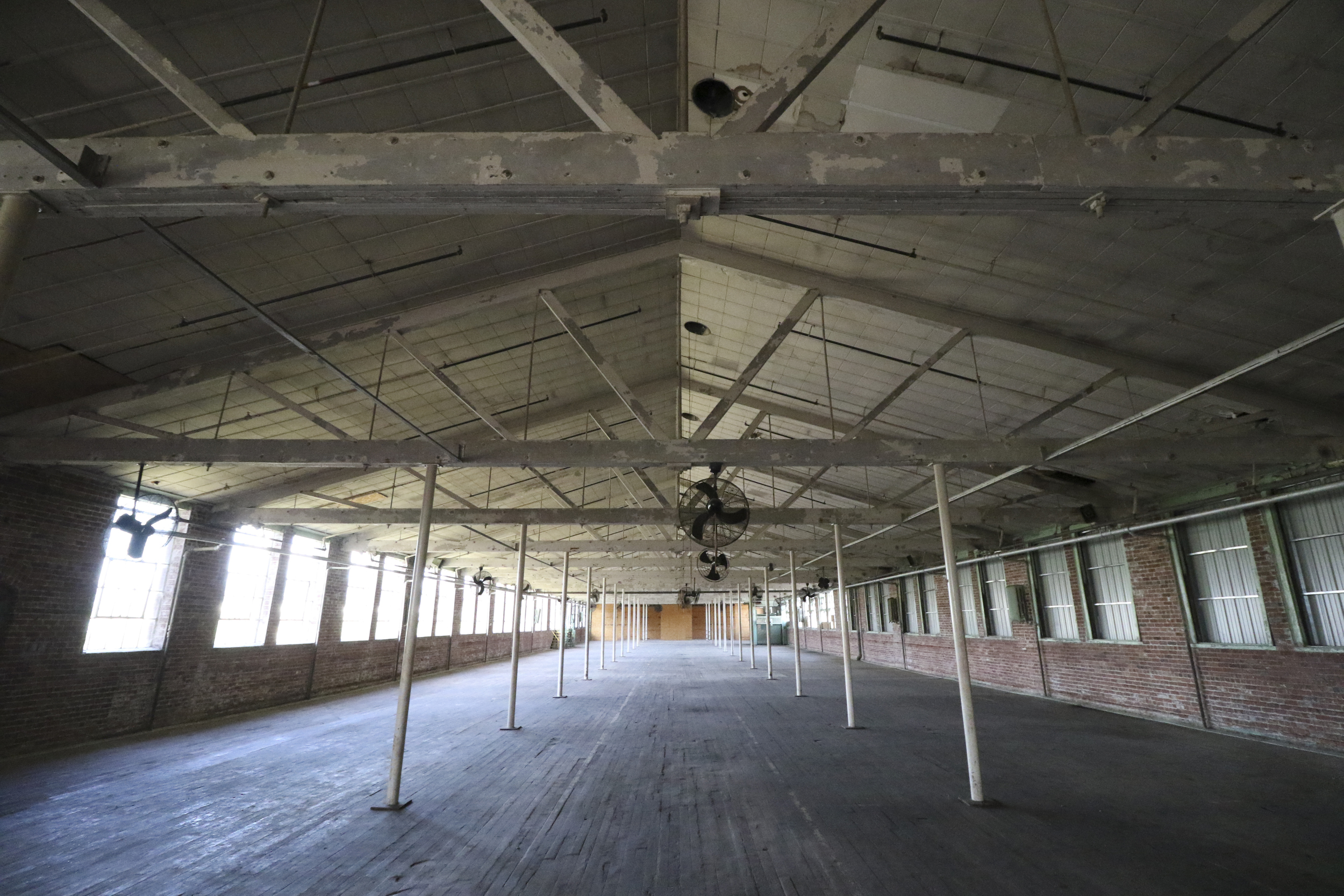 Staff Photo by Dan Henry / The Chattanooga Times Free Press- 7/27/16. Knitting Mill Antiques was recently purchased and will become the Signal Mill office and retail development complex.