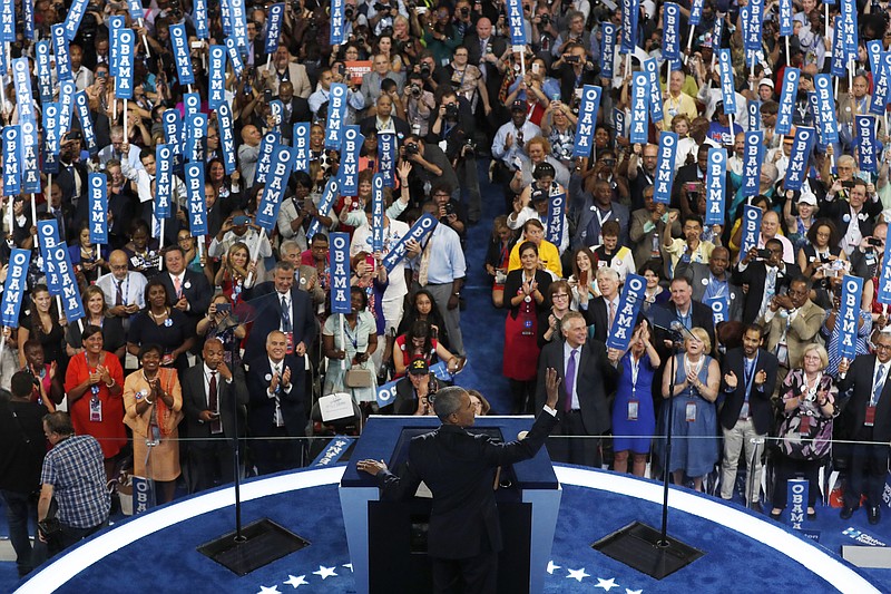 
              President Barack Obama waves to the delegates before speaking during the third day of the Democratic National Convention in Philadelphia , Wednesday, July 27, 2016. (AP Photo/Mary Altaffer)
            