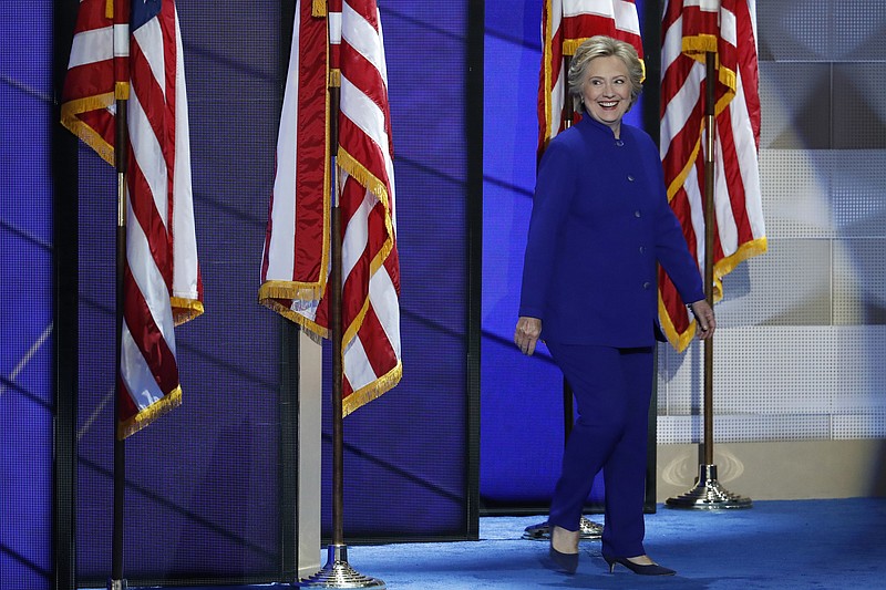 
              Democratic presidential nominee Hillary Clinton walks on stage after President Barack Obama's speech during the third day of the Democratic National Convention in Philadelphia , Wednesday, July 27, 2016. (AP Photo/J. Scott Applewhite)
            