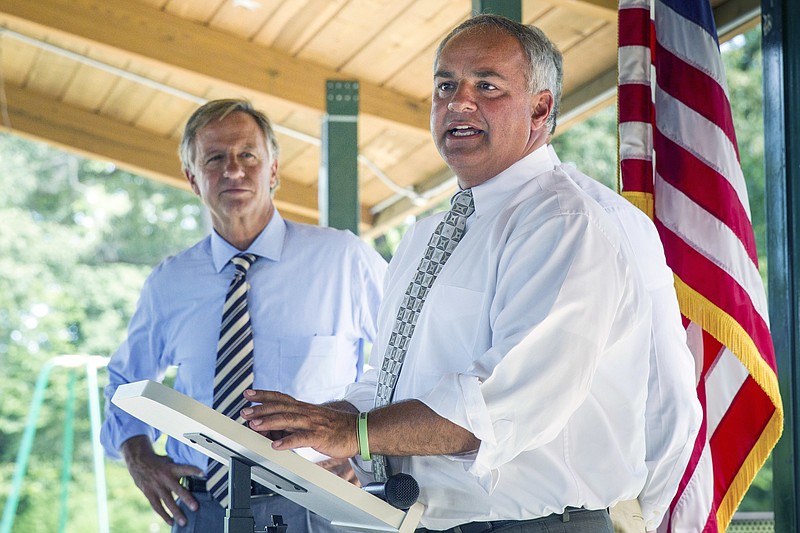 
              In this Tuesday, July 26, 2016 photo State Rep. Tim Wirgau, R-Buchanan, right, speaks at a grant announcement in Camden, Tenn. as Republican Gov. Bill Haslam looks on. Haslam says he has been happy to lend his support to state lawmakers facing tough primary challenges while making grant announcements around the state. (AP Photo/Erik Schelzig)
            