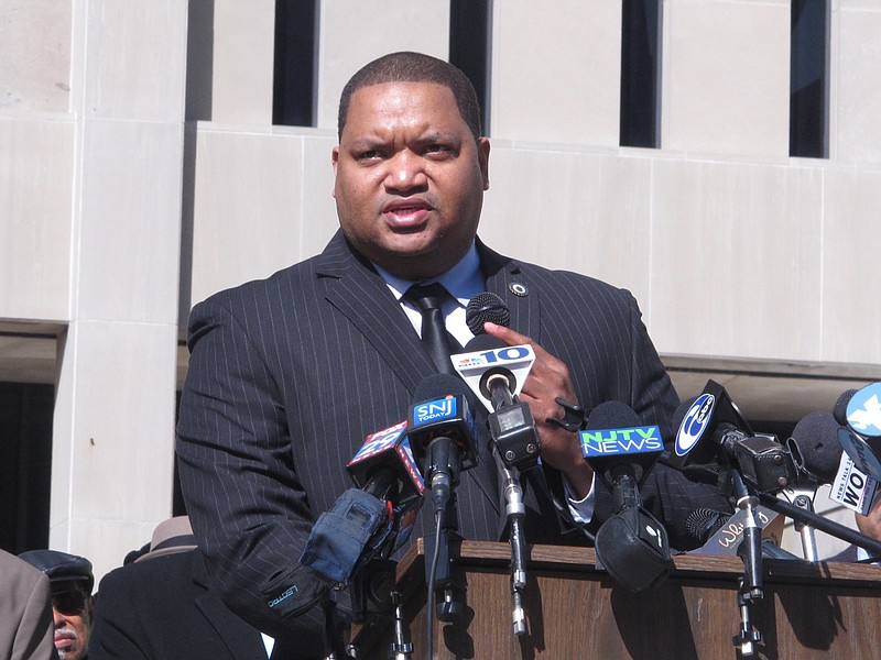 In this Feb. 22, 2016 photo, Atlantic City NJ City Council President Marty Small speaks at a news conference in his city against a proposed state takeover of its finances. On Thursday July 28, 2016, the council called an emergency meeting to accept a $74 million state loan that Small said would help it get through the rest of the year while fighting off a proposed state takeover. (AP Photo/Wayne Parry)
